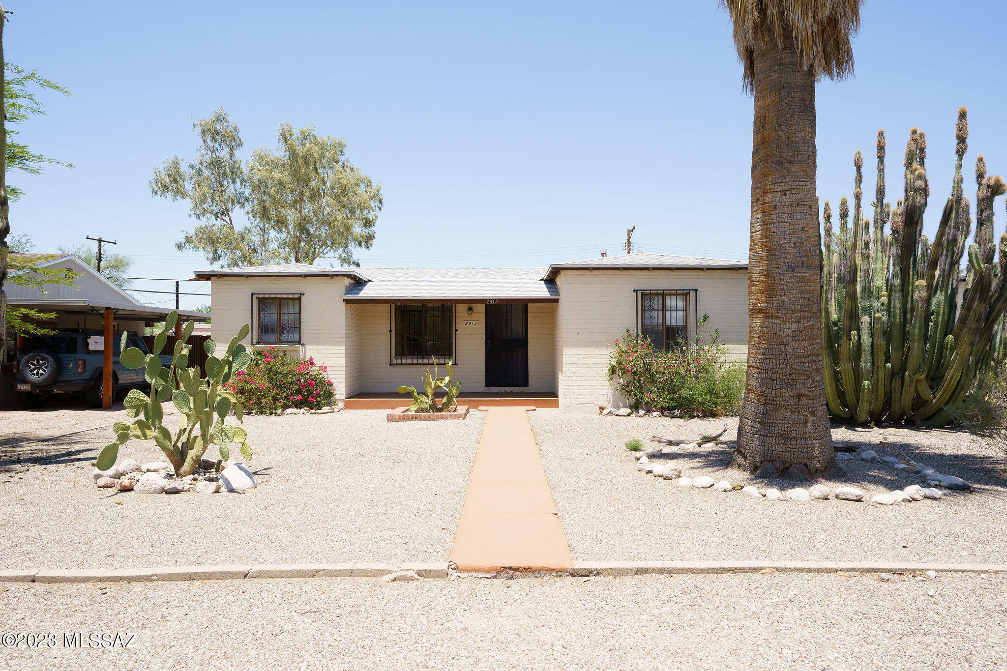 Location, Location, Location.  This home is located in the popular Blenmen Elm neighborhood.  Minutes to the UofA, hospitals, downtown, restaurants, shopping, golf and hiking.  This home has great curb appeal and is very charming. The home has been recently painted, new flooring and a newer roof.
The Laundry room has a washer and dryer, overhead storage and a door to the side yard. 
Enjoy the covered patio with colored concrete floors which opens to the large fenced yard. 
 The one car garage/workshop can easily be made into a guest area.  Visit this home today.