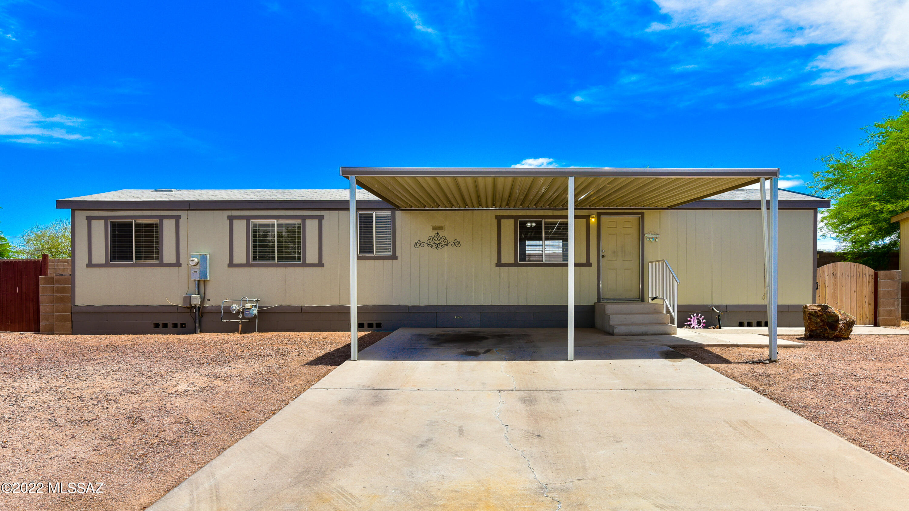Don't miss out on this beautiful 2 bedroom 2 bath home. This spacious home boosts vaulted Ceilings, open floor plan with a great kitchen island and lots of cabinet space. Huge extended 2nd bedroom with updated flooring and fresh paint throughout. Private back yard perfect for entertaining with double gated entrance, shed and covered patio. This home will not last hurry and view it today.