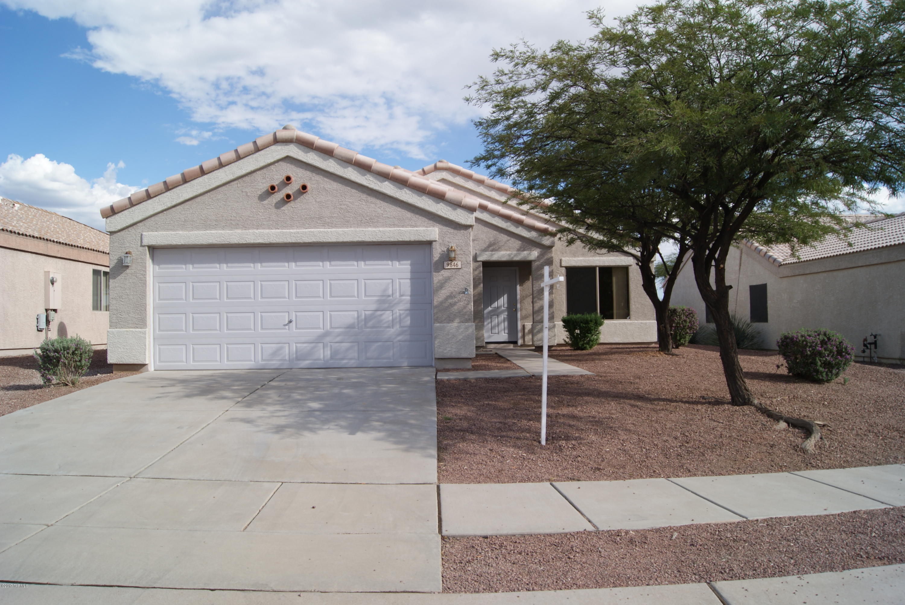 FULLY TILED! Cute as a Button 3 bedroom home w/ 1076sf in desirable Rita Ranch community & Vail School District! High Ceilings throughout, open plan, no space is lost. 18 inch Tile throughout, neutral light beige, freshly painted throughout, Dunn Edwards Cappuccino white (off white). Ceiling fans in living room & all 3 bedrooms. Pot Shelves in Living Rm. Kitchen has breakfast area, pantry, electric ceramic glass top stove/oven, built-in microwave, refrigerator w/ icemaker, disposal & dishwasher. Walk-in closet in master bedroom, large East-facing block fenced backyard w/ nice Covered Patio, washer & dryer hook-ups. HVAC installed 2011 (not original). Close to shopping w/quick access to I-10 & major employers. HVAC filters provided. Pet's require owner approval. 2 Max. Renter's Insurance.