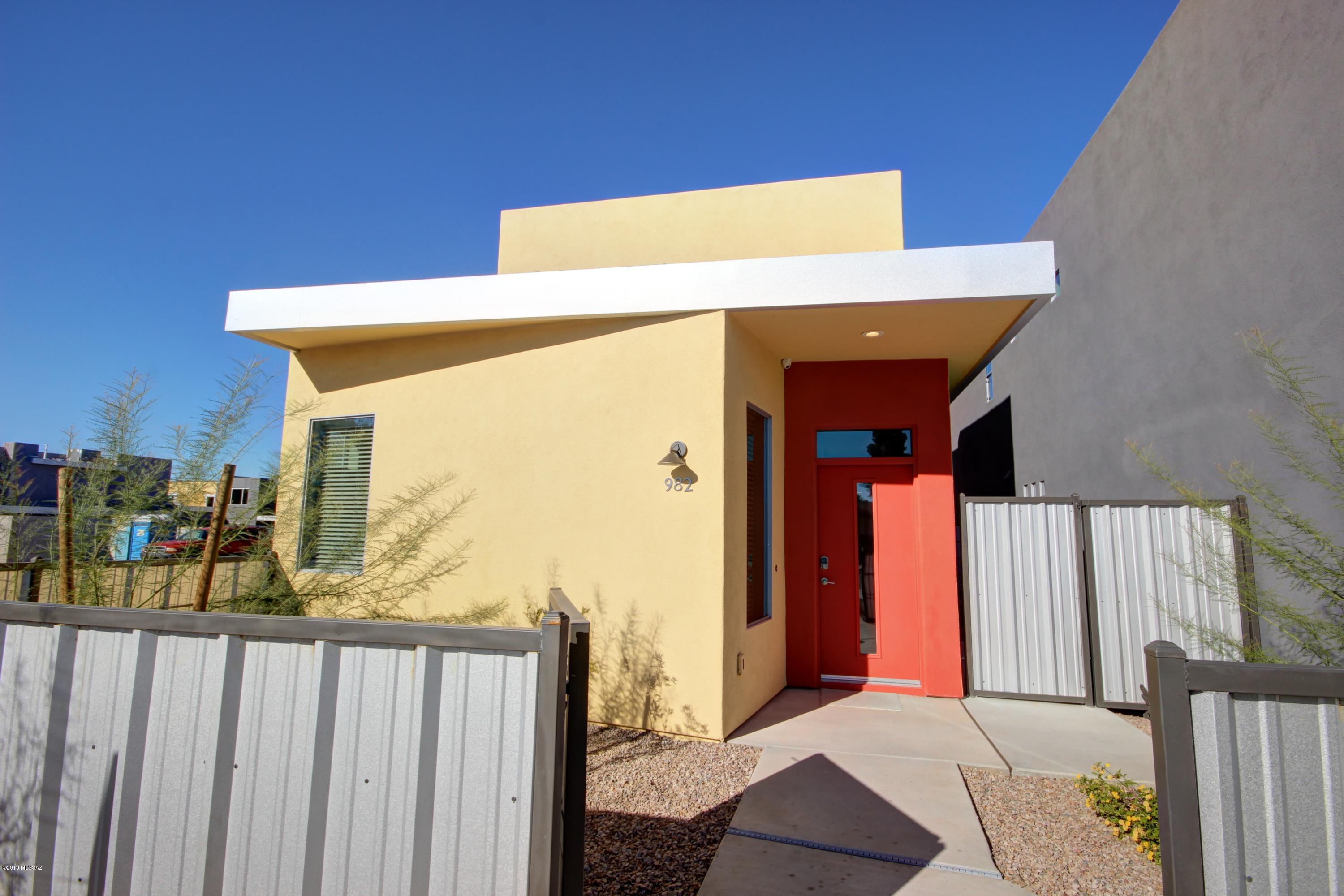 Quick Move In Pepper Viner Home located in midtown! Minutes to the UofA, Banner Medical Center, downtown, shopping & restaurants. Enjoy this open, modern architecture & loft-style two story living! Pepper Viner Homes is Southern Arizona's 7 time builder of the year. We are known for building energy efficient new homes with typical HERS ratings between 55 and 60. With 2x6 construction & spray foamed sealed attics our customers will have years of affordable utility bills. Home also includes an iPad that operates the standard security system and Google Nest thermostats. This home is loaded with many upgrades.  Pictures are of model. There is still time to pick out your own options. Please see associate for details.