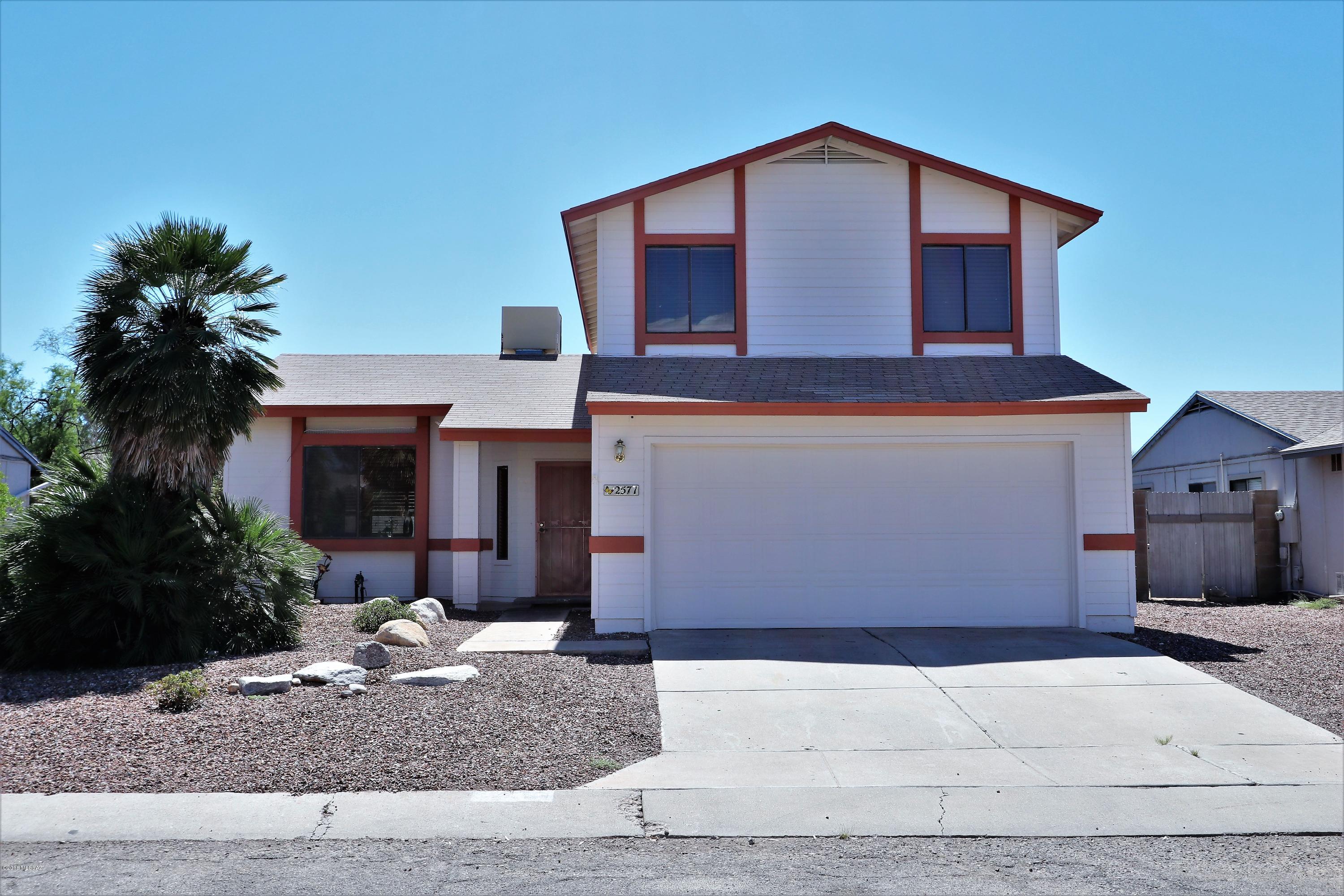 Lovely home in a desirable neighborhood, with great community amenities. One bedroom downstairs and three on the second floor.  Large backyard with covered patio, freshly painted exterior, new wood fencing in backyard. Great location, close to schools, shopping and minutes from I-10.