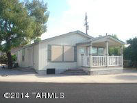 Tucson Estates Adult Community: Beautiful 2013 Cavco home.  Furnished and ready for new owners.  This 2013 Cavco Home, 2 BD,  2 BA is a perfect year around or winter retreat. 2 x 6 construction & extra insulation, Dual pane windows and so much more. Tucson Estates is a 55+Community, $121 association fee includes free golf, tennis, shuffleboard, 3 pools, spa, exercise room, ...and a lot more! You own the land! AZ retirement at it's BEST! 15 minutes to downtown Tucson