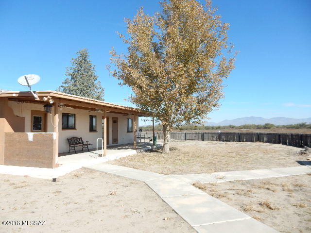 Animal lovers this is a good one   160 Acres with block Ranch Style  Home 3bedrms/2 bath.  Patios on both sides with large fenced in yard.  Large Work Shop with additional 30x60 covered slab area.  Some additional outbuildings covered with  small pens inside on cement slabs.  160 acres fenced and crossed fenced   Great views of all the surrounding mountains.  20 minutes to Willcox but private.