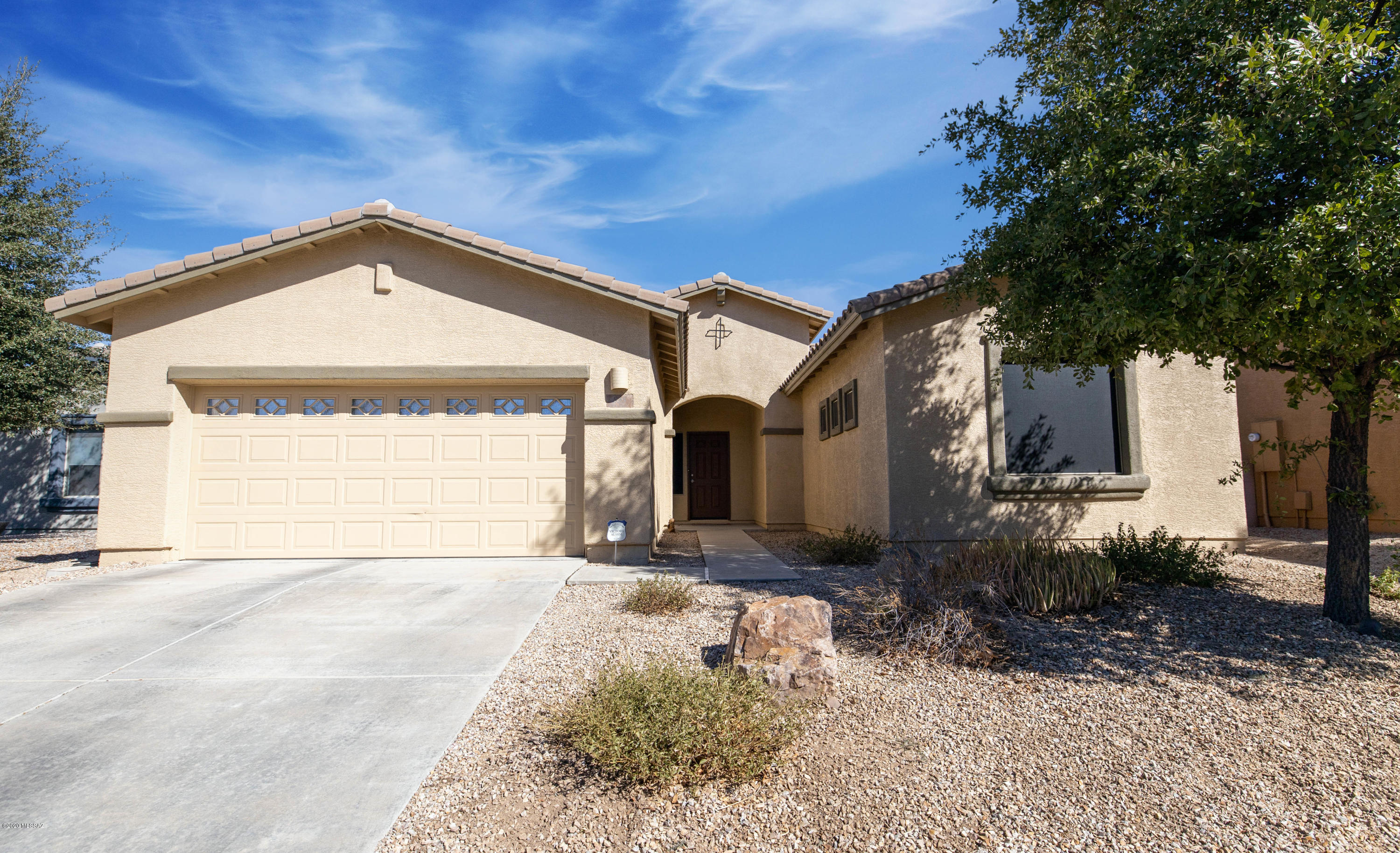 This superbly kept open floor plan home has a remarkable private backyard that is perfect for entertaining and relaxation with the built in hot tub, fire pit and pavers! This spacious beauty is 3 bedroom, 2 baths and 3 car garage! The master bathroom offers a double vanity with a built in sit down vanity space along with a garden tub and seperate shower. The master suite is open and offers privacy with the split floor plan and access to back yard. Must see to fully apprecite this beautiful property. Many upgrades such as the kitchen with a breakfast nook, new exterior paint & new solar screens. 
This property won't last long. Range Pricing $285,000 - $295,000