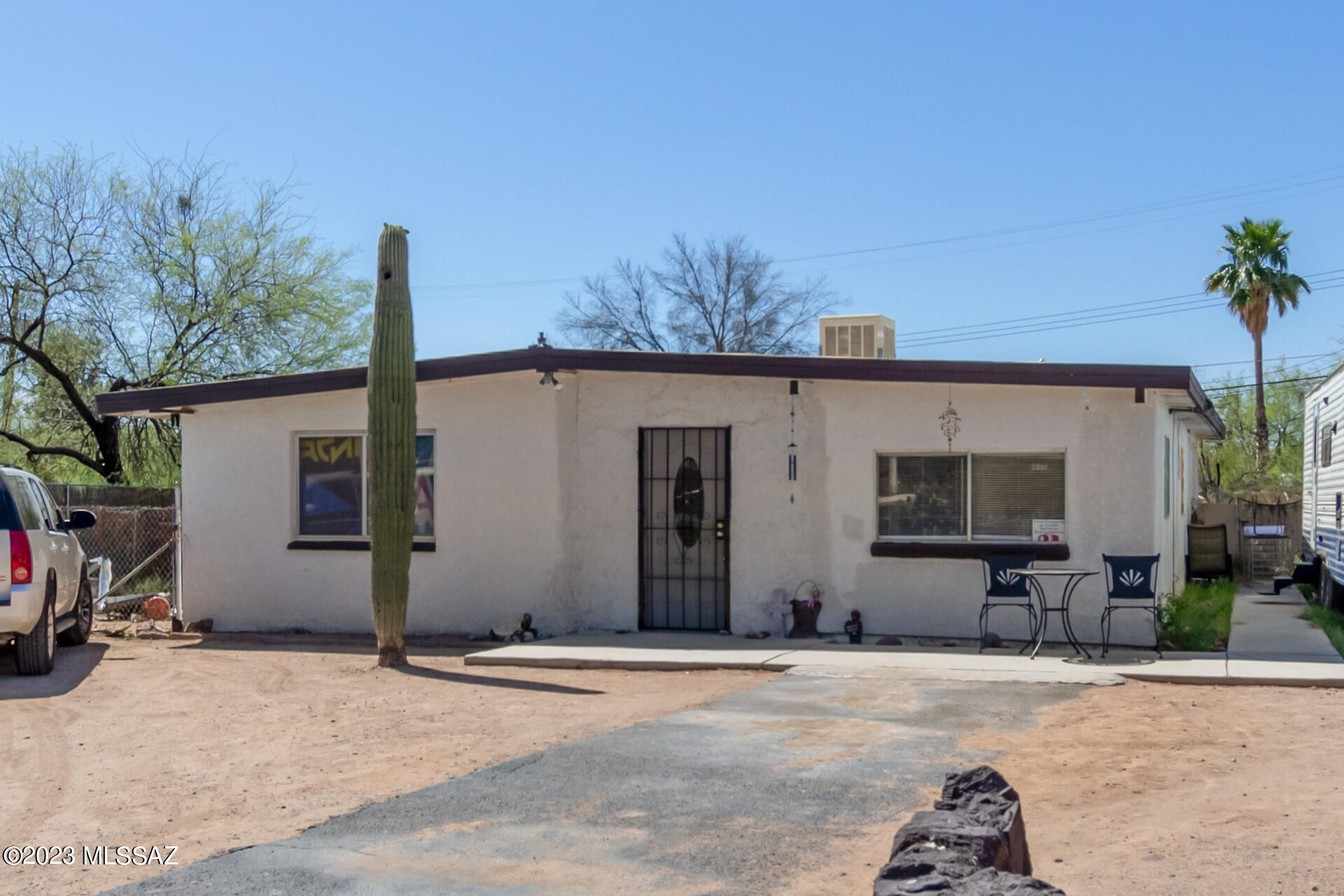 Welcome! Take a look at this single-level mobile home with no HOA now looking for its new owner! Get an up-close look to discover a bright living room, tile flooring, and a soothing palette. Gather around the well-sized family and dining room with concrete flooring and vaulted ceilings. Cooking is a delight in the kitchen, providing plenty of wood cabinetry and backyard access. The primary bedroom has a sizable closet and a private bathroom with dual sinks for added comfort. Secondary bedrooms boast beamed ceilings and one with a sitting area. Host gatherings in the spacious backyard with a fire pit and storage shed! This property is located near shopping spots, restaurants, and so much more. Enjoy incredible mountain views! What are you waiting for? Make this gem yours now!