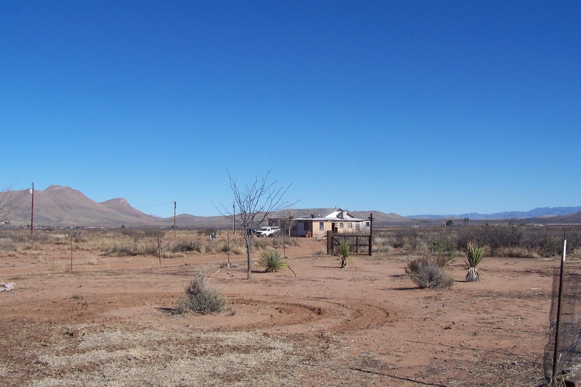 40.04 ac with water, electric and septic. Several opportunities with this property. Plenty of room to build your dream home including a slab where a home once stood. there is also a large building that could be converted into a home. Also the possibility of just living in an RV. The property sits on a dead end road, and the views are awesome. Several orchards and vineyards surround this property. This property is priced to sell. (sale includes both parcels 114-01-076A & 114-01-076B)