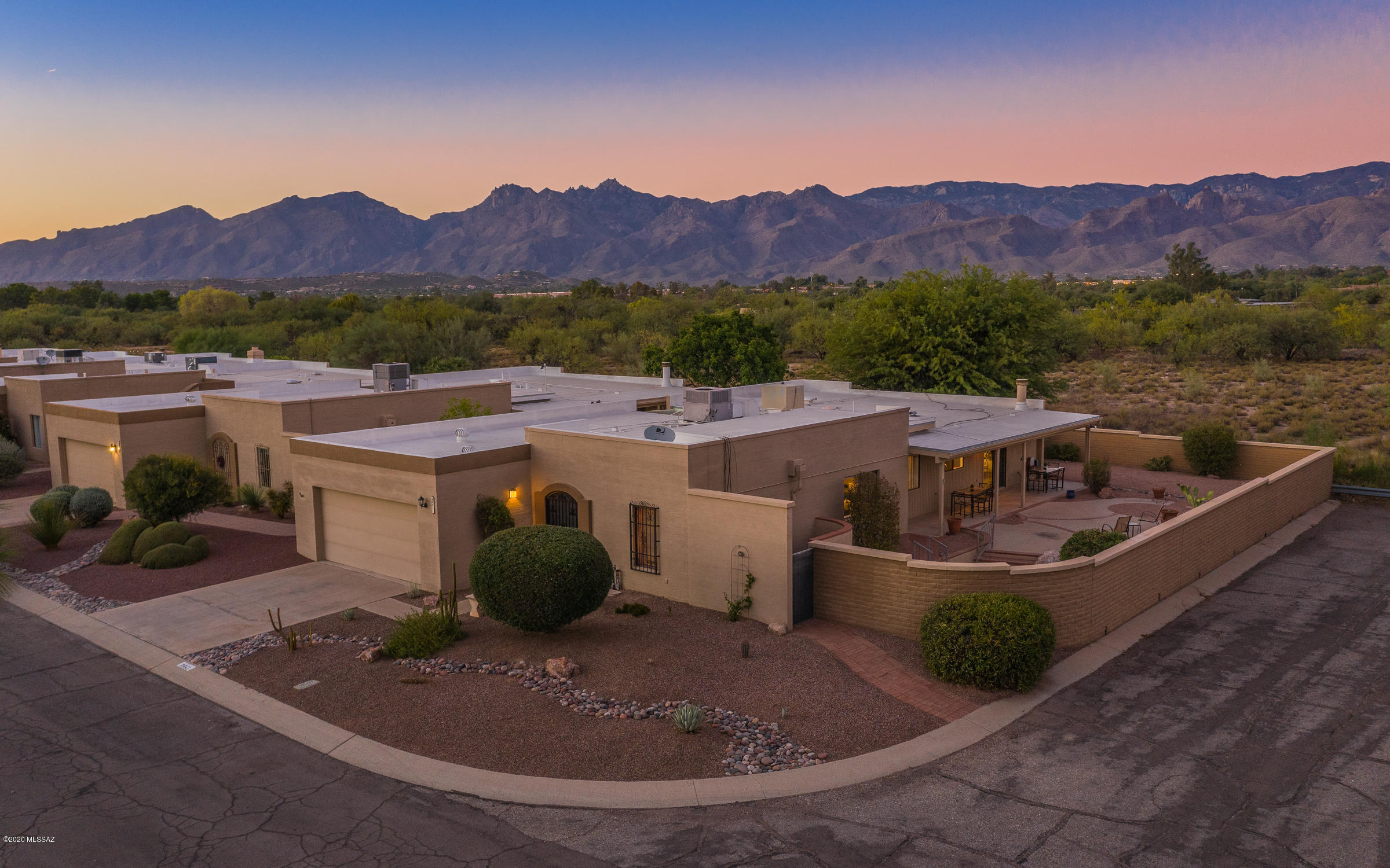 This AMAZING and ONE-OF-A-KIND home, located in desirable Fountain Park on a PREMIUM corner lot is waiting for You!  STUNNING MOUNTAIN VIEWS and great curb appeal.  Wonderful floorplan featuring  a spacious living/dining room and a delightful atrium. The updated and sensational chef's kitchen features tiled flooring, pendant lighting,  a corner gas fireplace and sitting area; top-of-the-line stainless steel appliances and an abundance of cabinets and countertop space. The updated owner's ensuite features dual vanities, a  large walk-in shower and a separate ''jacuzzi'' soaking tub plus two walk-in closets.  This is Arizona living at it's best with the full-length covered patio and sitting areas . Great spot for entertaining your family and friends. Community pool & park. COME TAKE A LOOK!