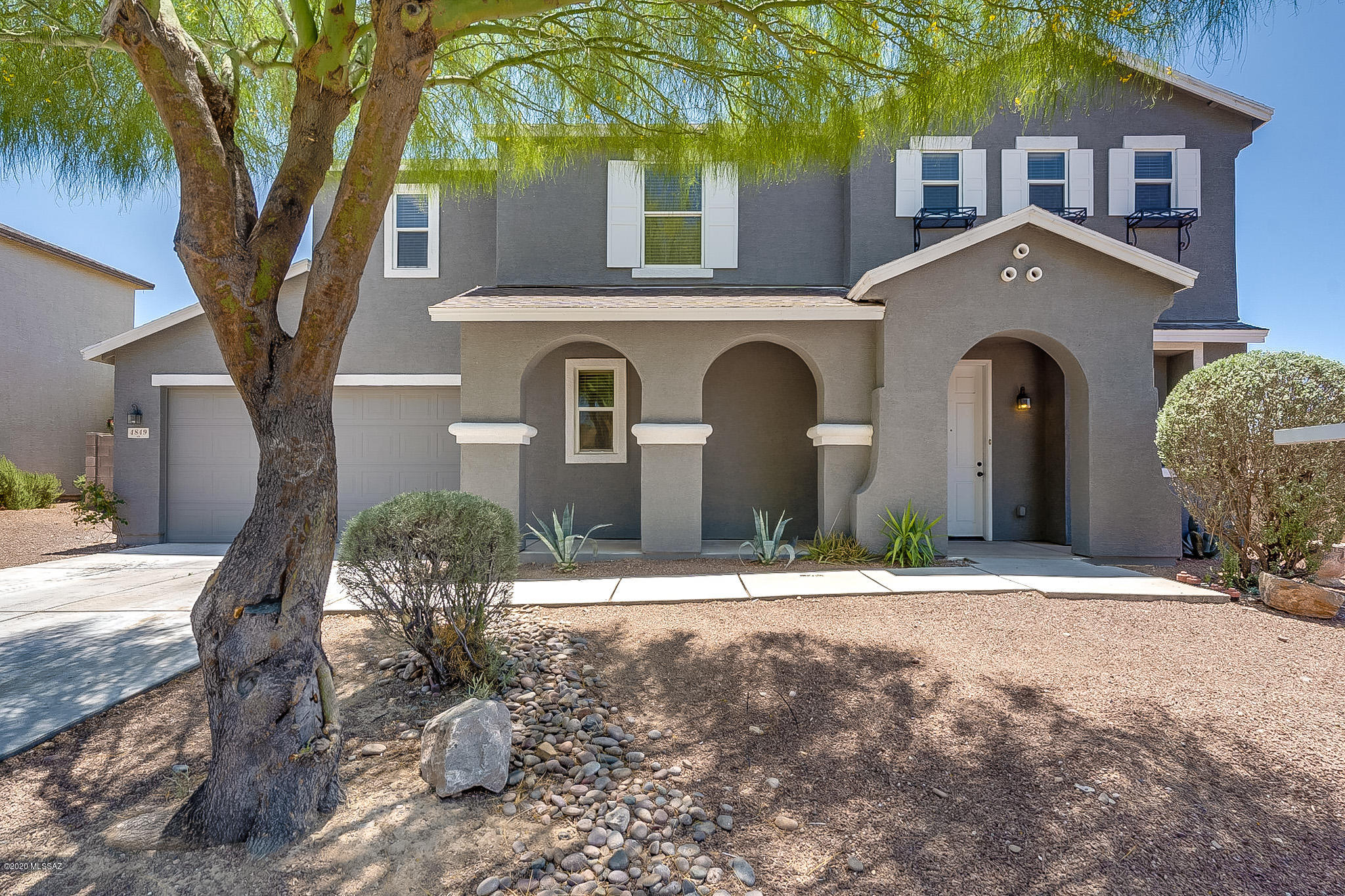 Beautiful 2 story home located in Southwest Tucson! This property offers an open floor plan and many tasteful upgrades throughout! The upstairs den has been enclosed and can now be used as an additional room or an office for those who work from home. It comes with gorgeous mountain views, a backyard fit for entertaining and minutes away from Old Tucson Studios, Desert Museum and other hiking trails. The only thing missing is you!