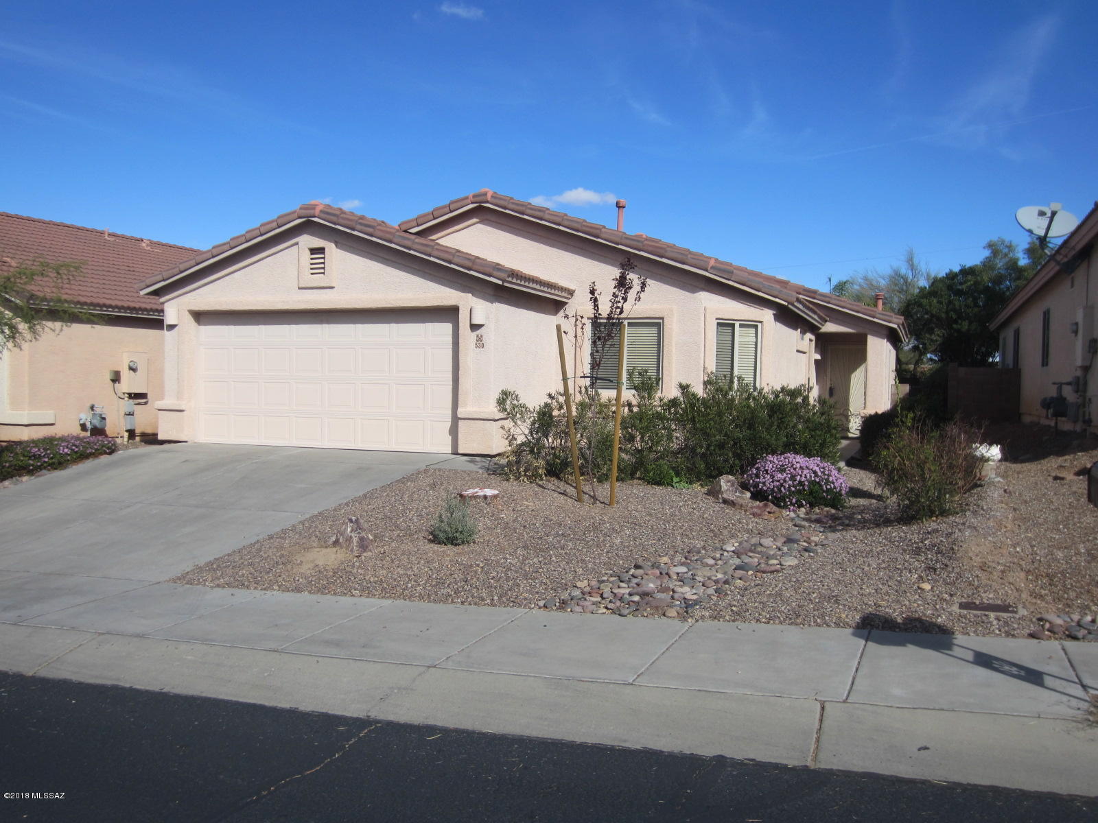 You will love this home! 4 bed/2 bath plus an Amazing back yard - extended porch, flagstone/brick patio, fire-pit and sitting area, low care planting area and no homes to the rear affords great privacy and Pushridge views. The interior has tile throughout, (carpet in two bedrooms). Kitchen has beautiful granite counter tops/tile back splash, with large breakfast bar for entertaining. The bedrooms are large w/great closet space.  Many upgrades include, 17 seer AC unit, newer hot water heater, water softener, and plenty of garage storage. Fridge, washer & dryer and freezer also included.