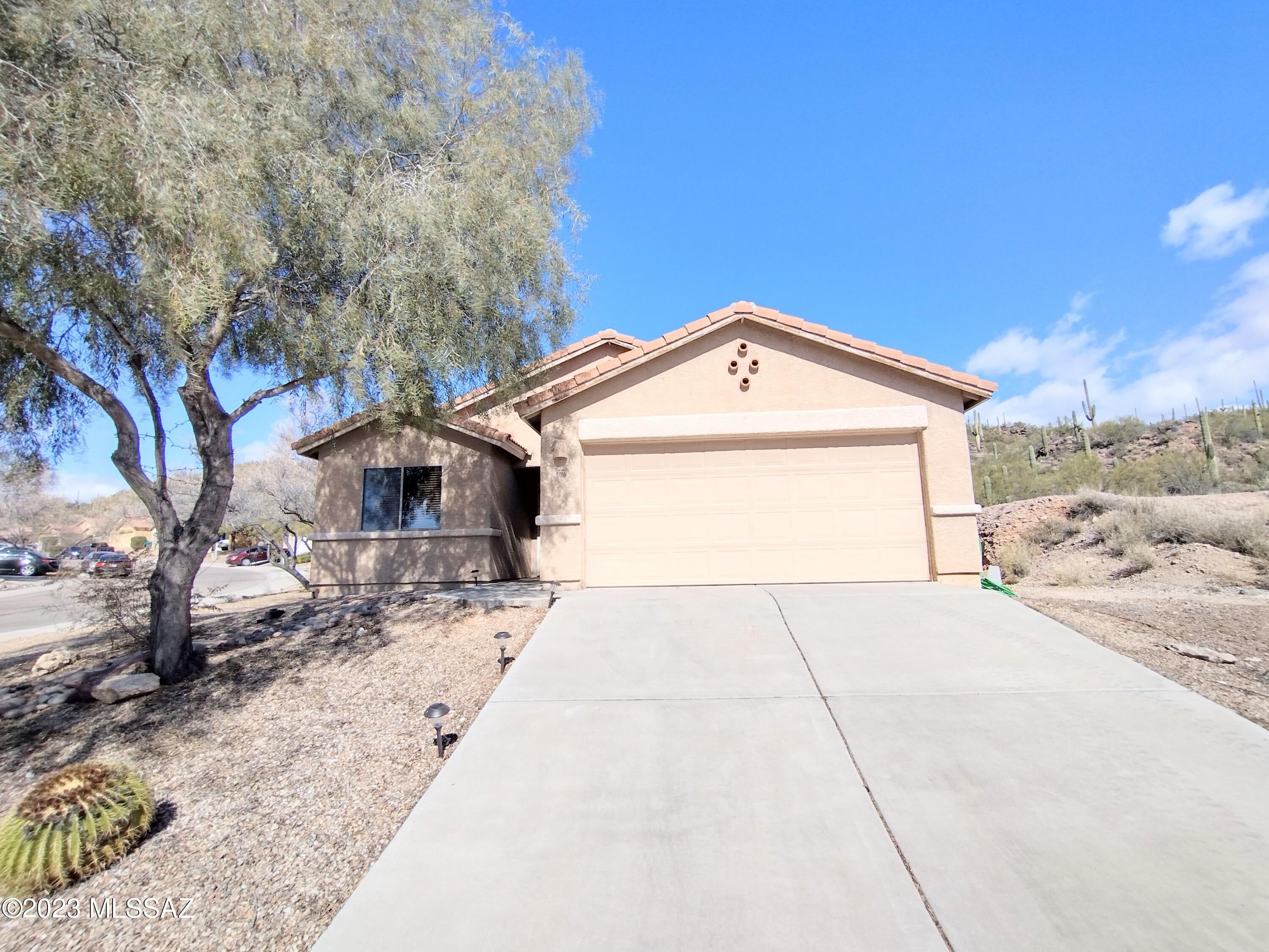 This charming 3 bed, 2 bath single family home features an open and airy floor plan with vaulted ceilings and ceramic flooring throughout. The kitchen is open and has lots of cabinet space and granite counters. Washer and dryer are included in this home. Enjoy the extra large extended back patio with mountain views, tons of saguaros, and wild life. Unless otherwise requested by tenant put down to Blue Fox is an Equal Opportunity Housing Provider. We are also licensed Realtors