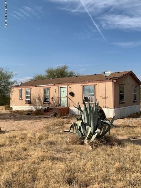 New HVAC unit just installed and new flooring soon throughout. One acre horse property with shed/barn to store all the extras. Fully fenced with front gate and easy access
to main road. If you're looking for a place for your animals, owners have added corrals with shade and water. The home is in need of some
TLC but has great ''bones'' and is ready for the next owner to add their own style. Come take a look and create your own ranchette.