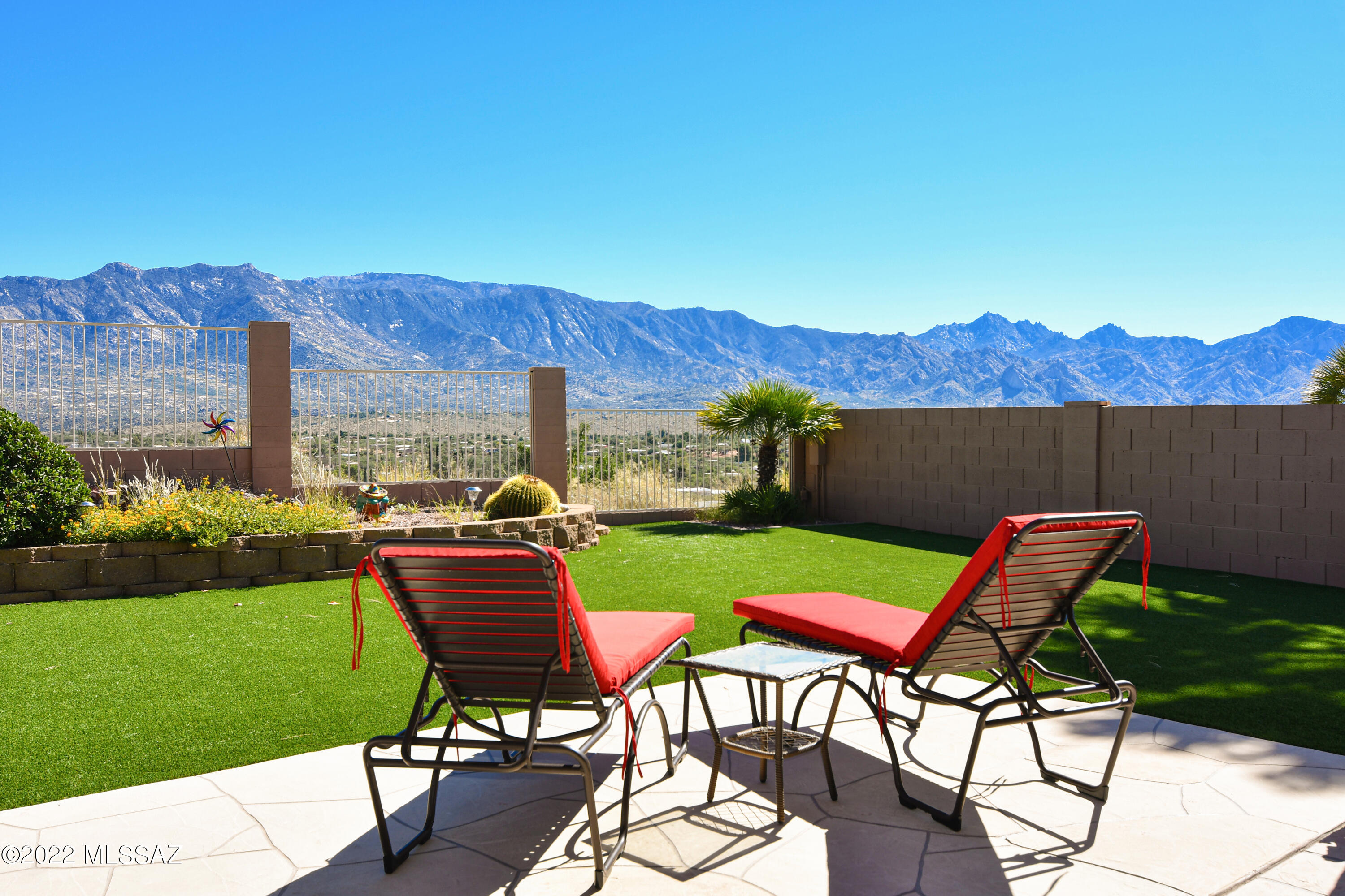 Stunning Desert Oasis Model in Eagle Crest Ranch Backs to Open Space on best street in neighborhood w/ Panoramic Catalina Mountain Views. Spacious Kitchen, Granite Counters, S/S Appliances, Tons of Storage Space, Cabinets with Pullouts, Butler's Pantry, Center Island, Breakfast Bar & Dining Area. Open Great Room with Vaulted Ceilings & Wall of Windows showcasing views .Formal Dining Room/Den. Spacious Primary Suite w/ Slider to Covered patio, Walk-in Closet and primary bath with Double Vanity, Separate Shower & Tub. Two additional bedrooms w/ guest bath.  Large oversized 3 car garage. Fabulous resort style outdoor Living with Pebble-Tec Pool, Water Feature, Large covered patio , Meticulous Landscaping, Low Care Artificial Turf, pool storage & Mountain Views.  This is it!