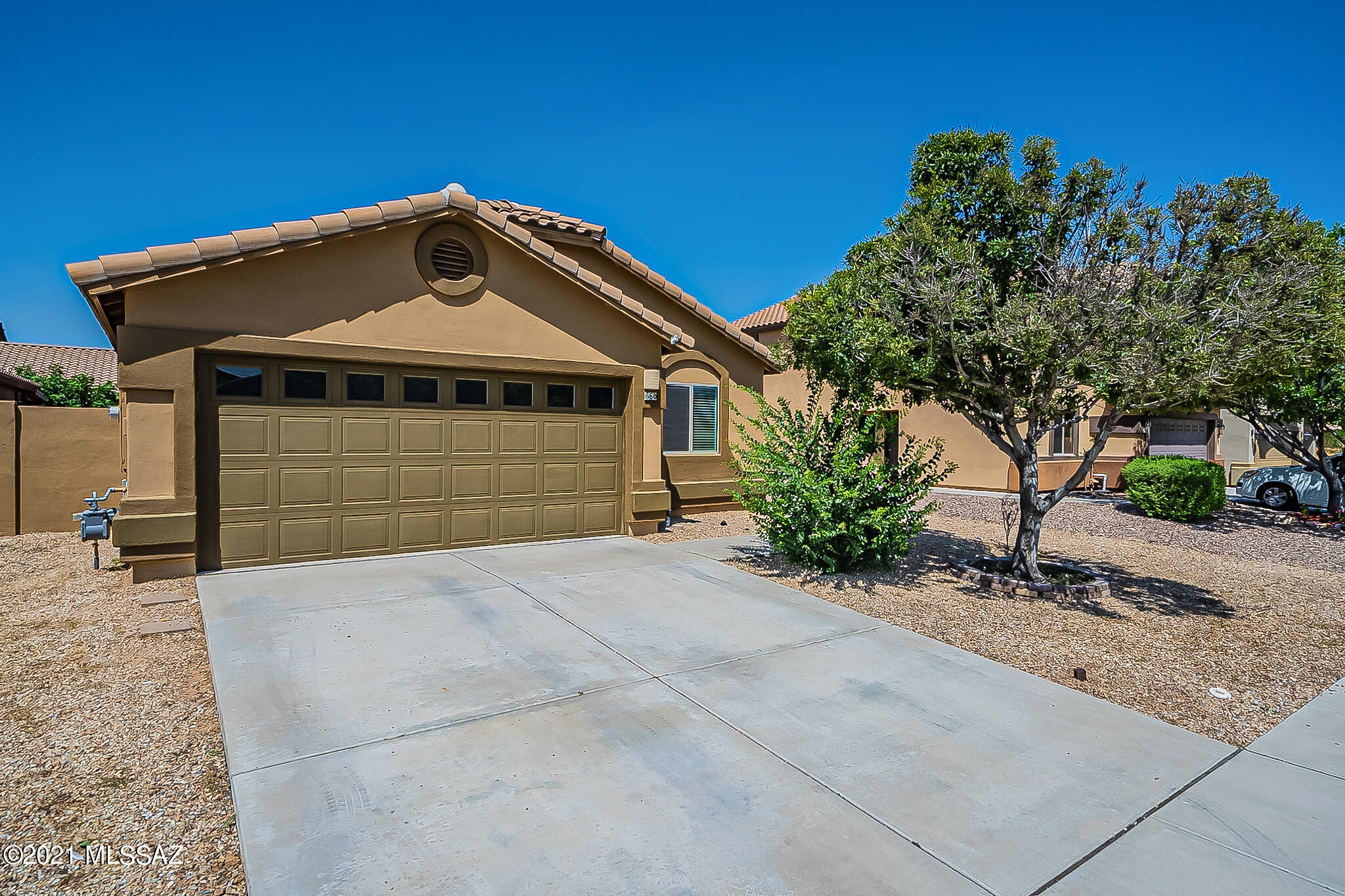 Well maintained 3 bed 2 bath with Low Maintenance yards! Pecos floor plan with Vaulted Ceilings and a Den. Kitchen has Stainless Steel appliances with Maple Cabinetry. Garage has Epoxy floor and built in cabinets. Walking distance to neighborhood parks, pool and running paths. This great home is located about 5 minute drive to Sahuarita Lake Park. Call for an appointment and have a look at this ready to move in home!