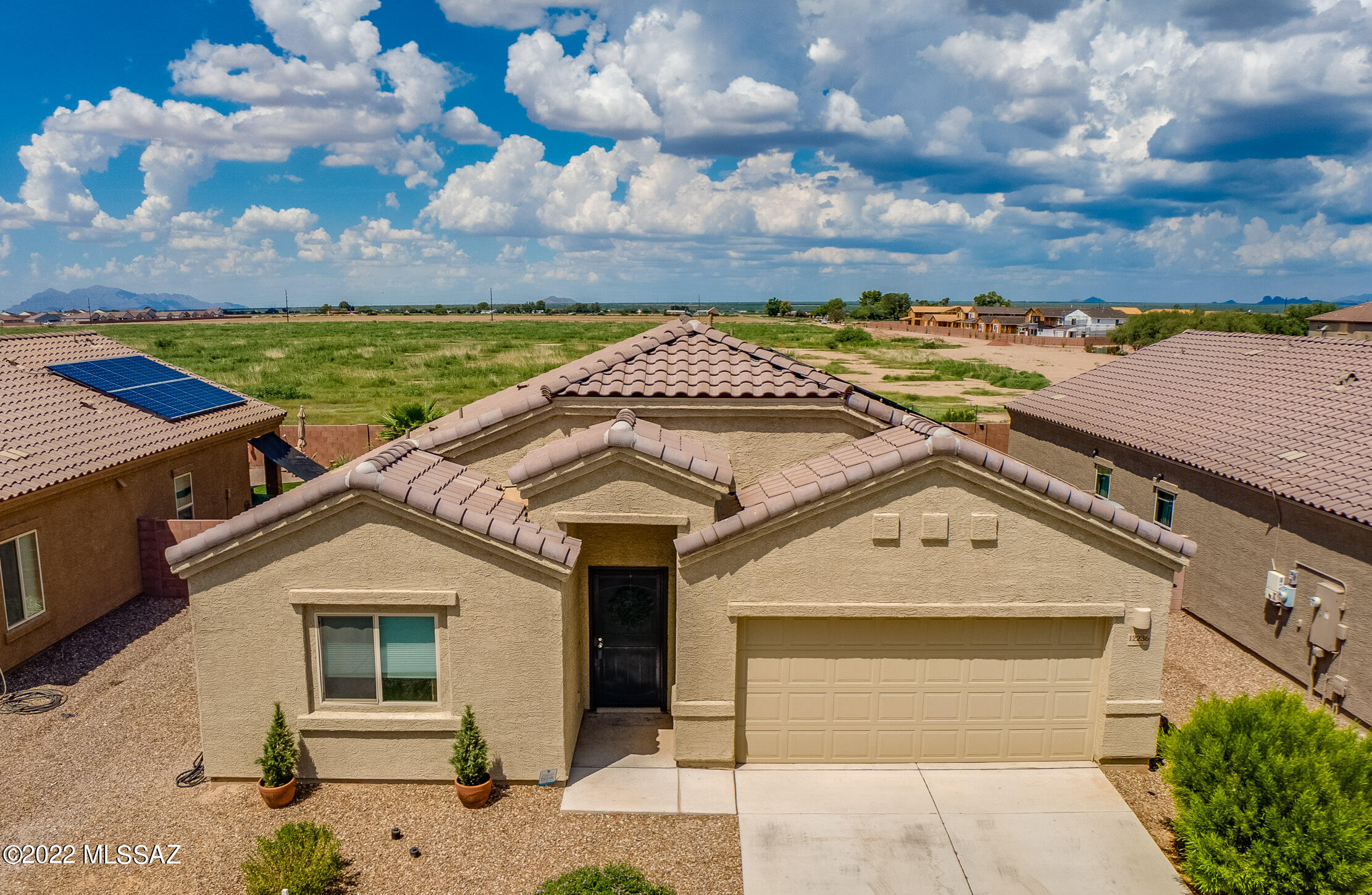Highly desirable  Fianchetto Farms home for sale. 
Single story floor plan with an open concept kitchen that opens to the dining area and great room. Birch cabinets complimented by Quartz countertops and stainless steel appliances. High end Ceiling fan in the family room. In the primary bedroom, dual vanities AND a large walk - in closet. 16 x 16 ceramic tile floors with carpet in the bedrooms. Solar will help with the electric bill. Solar Lease will need to be assumed.
The backyard is a blank slate waiting for the right person.

Majority or the inside has been repainted. A must see.