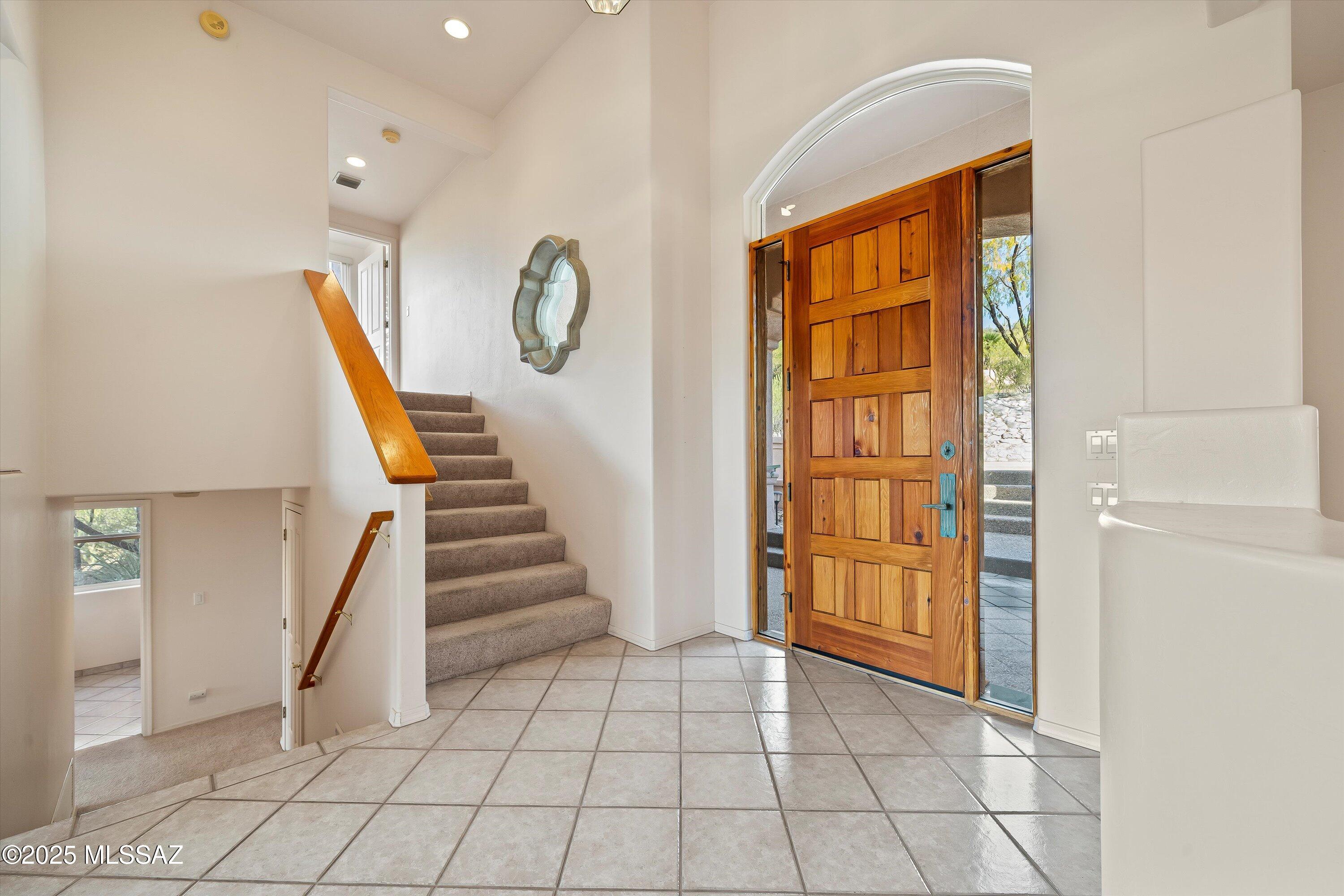 This well maintained 4-bedroom, 3.5-bathroom property offers the perfect blend of comfort, convenience, and versatility. A mother-in-law suite is equipped with its own kitchenette, full bathroom, and living space, offering independence and privacy for its occupants.
The main living area boasts an open-concept design with abundant natural light, a cozy living room, and a open kitchen with granite countertops, and a large center island. The primary suite includes a walk-in closet and a en-suite bathroom for your private retreat.  Enjoy the large patio with great mountain views.  This home is just minutes from schools, shopping, and dining.