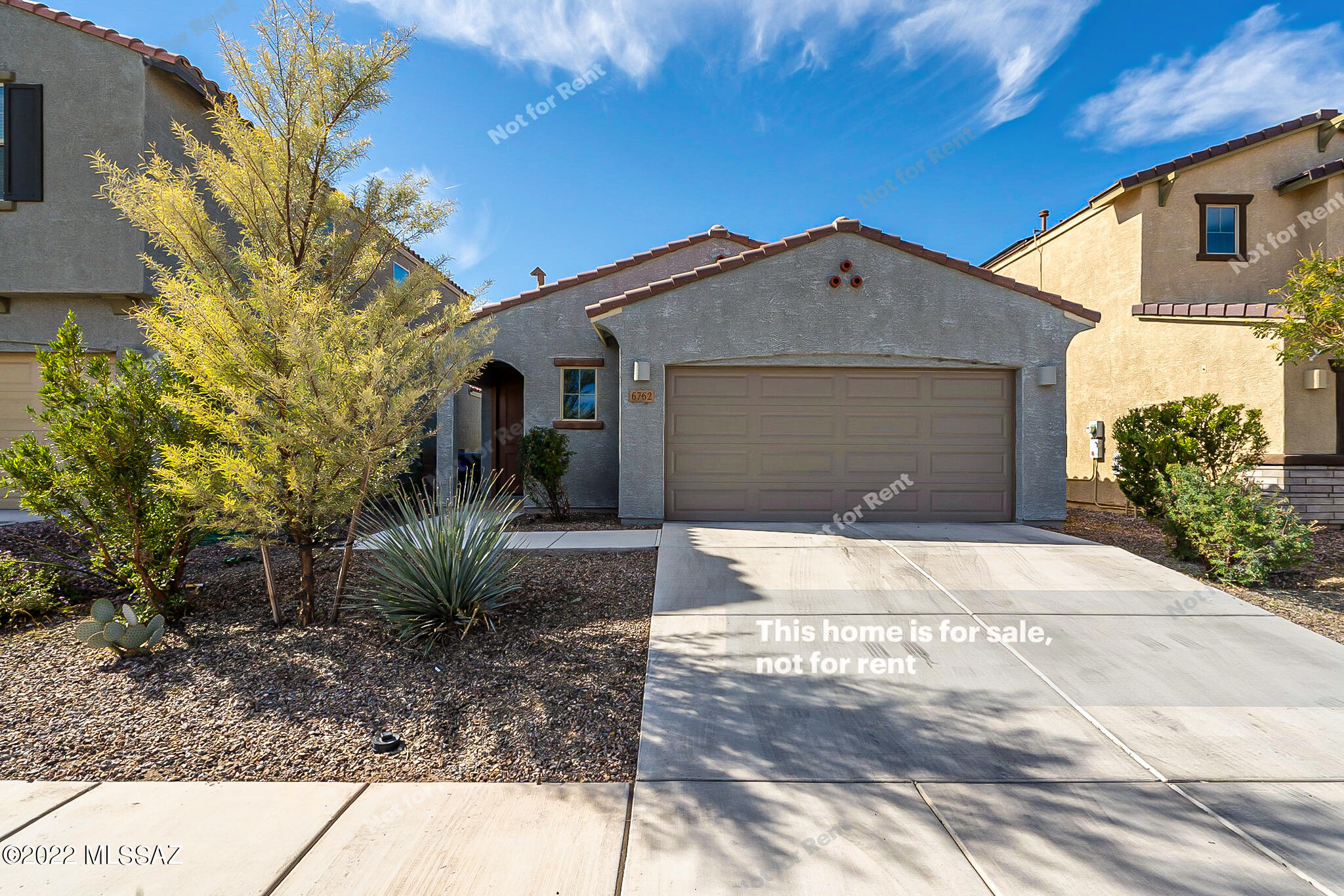 Look no further! This 3 bed, 2 bath residence now on the market is for you! Charming curb appeal, easy-care landscape, and 2 car garage! Inside you will find a spacious dining & living area w/tile flooring, modern light fixtures, and neutral palette throughout. The elegant kitchen is comprised of espresso cabinetry w/a pantry, granite counters, recessed lighting, tile backsplash, SS appliances, and an island w/breakfast bar. The main bedroom boasts a walk-in closet and ensuite w/dual sinks. The large backyard, with its covered patio, has tons of potential to become your own private oasis! The good ones never last, hurry and schedule a showing today!