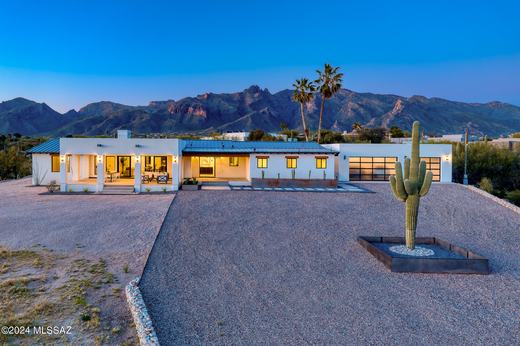 COMPLETELY remodeled & expanded on a fabulous 2.41 acre serene view lot TUCKED FAR BACK & AWAY-NOT ON CAMPBELL! The orig architectural design elements have been honored via lightly whitewashed exposed brick walls, dramatic wood beams, & a reimagined mid-century design fp. Engineered wood floors, stunning lighting, & modern finishes seamlessly blend the old w/ the new in a casually elegant open plan. A show-stopping kitchen is anchored by a vast quartz countertop island w/bar seating & new gleaming SS appliances. All new primary suite that will WOW you w/beamed ceiling & a magnificent spa-like  bath. Main living spaces boast view-framing glass slider doors; massive outdoor living/dining room, artificial turf, contemporary planters a< brand new 3-car garage AND a pet shower station NO HOA!