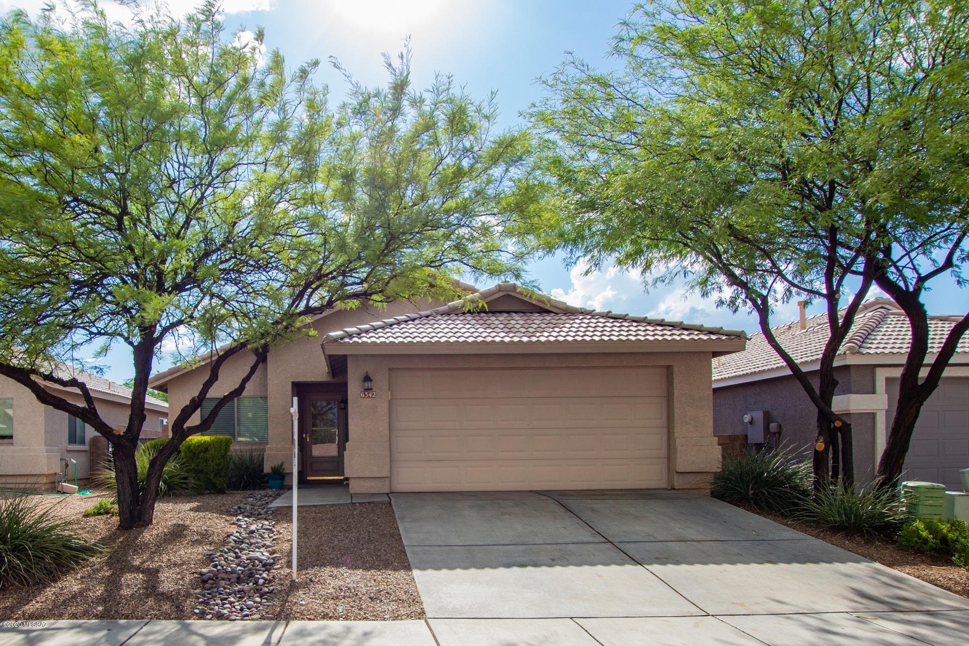 Seller will entertain offers between $199,900 - $209,900.  Come by and check out the beautiful and move in ready home!  This home is located in Mesquite Ranch with convenient access to community pool and park!  When inside the home you will quickly notice the vaulted ceilings, surround sound pre-wire, ceiling fans throughout, and an upgraded kitchen with newer stainless steel appliances and granite countertops.  This home also includes a covered rear patio, large yard and ALL appliances.  If you are looking for a turn key home in the Vail School District; then this may be the home that you have been waiting for!