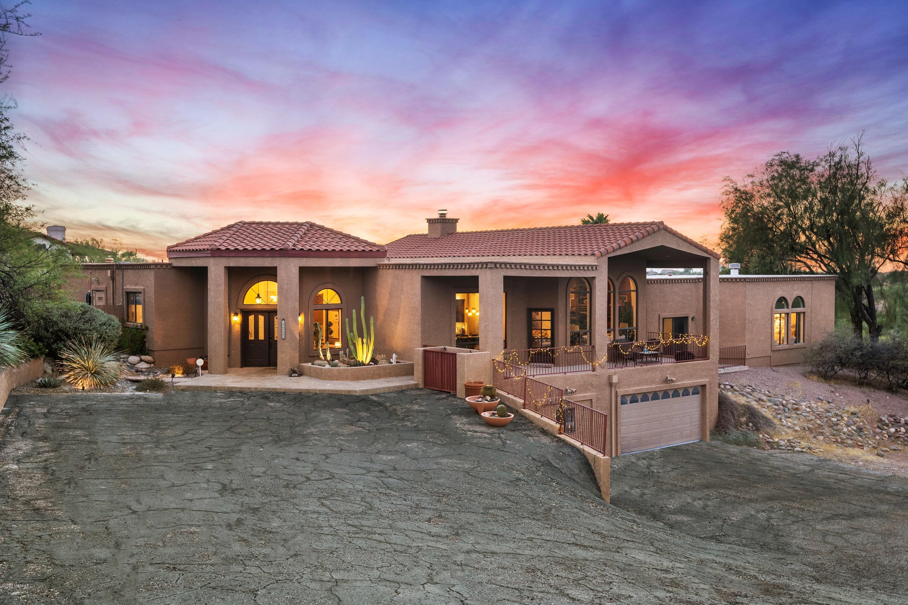 HILLSIDE CUSTOM HOME WITH STUNNING PANORAMIC MOUNTAIN & SUNSET VIEWS ON HUGE 1.26 Acre Lot in Catalina Foothills District 16. HIGH END UPGRADES throughout home. This Home Features a Luxurious Great Room with High Ceilings, Fireplaces, Huge Built in Entertainment Center, Bar, & Custom Alder Woodwork! It has a Beautiful Formal Dining Area, HIGH END Kitchen Upgrades w/ Granite Tops, Breakfast Bar & Thermador Stainless Steel Appliances. Luxurious Master Suite with Huge Walk-In Closet, powder room, fireplace & Private Office/Study. Resort style backyard with Ramada, waterfall, mature fruit trees and a sparkling pool overlooking La Paloma golf course with fantastic mountain & city views. Perfect Entertaining Home. Community features Tennis Court & Rec /Club House. PICS-> https://hd.pics/x163654