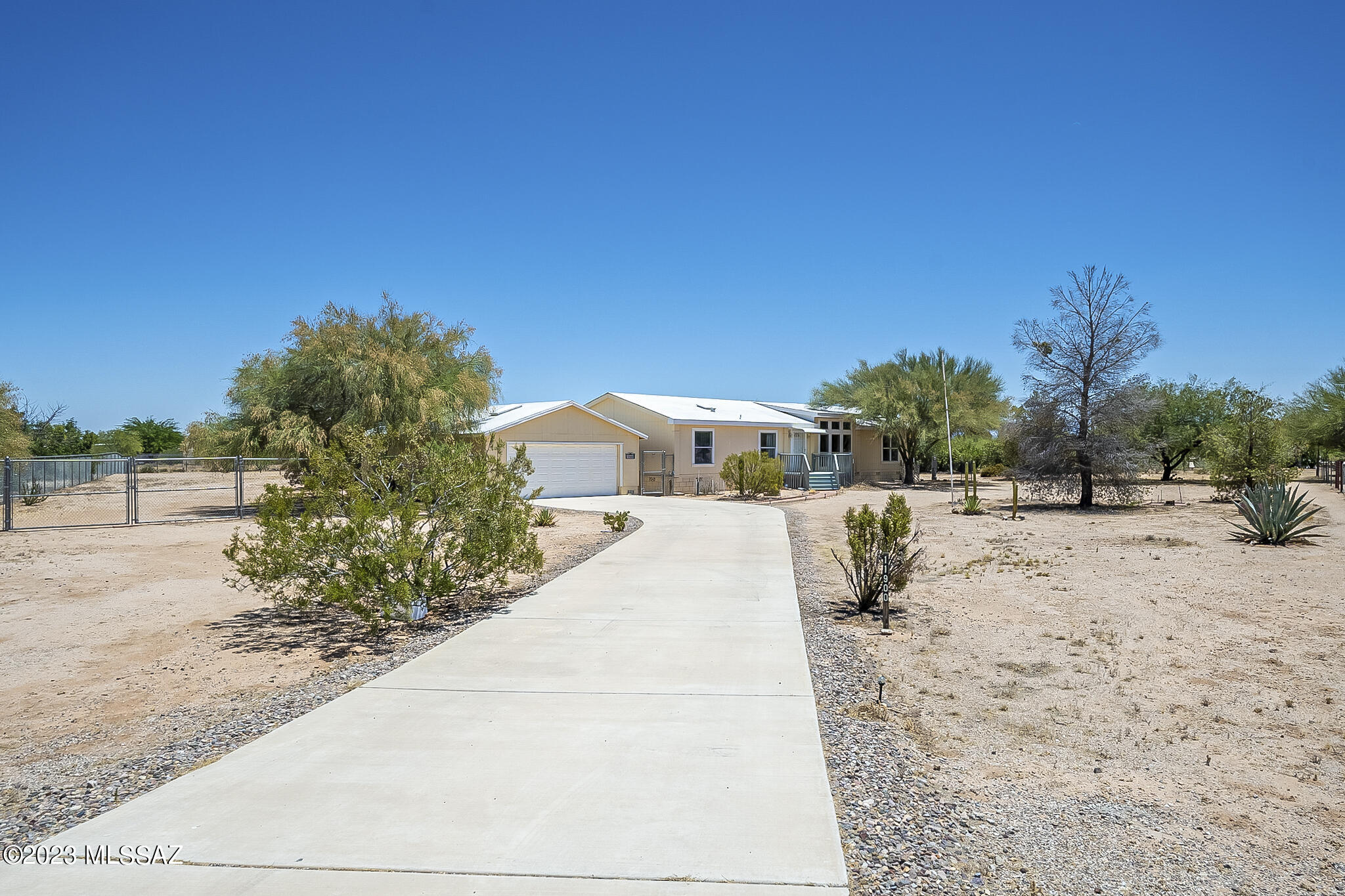 Escape to tranquility with this 3-bed, 2-bath manufactured home on over an acre. Enjoy spacious living, privacy, and endless outdoor potential. Spacious kitchen, comfortable bedrooms, and a serene atmosphere. Conveniently located near amenities. Your dream retreat awaits! Schedule a showing now!
