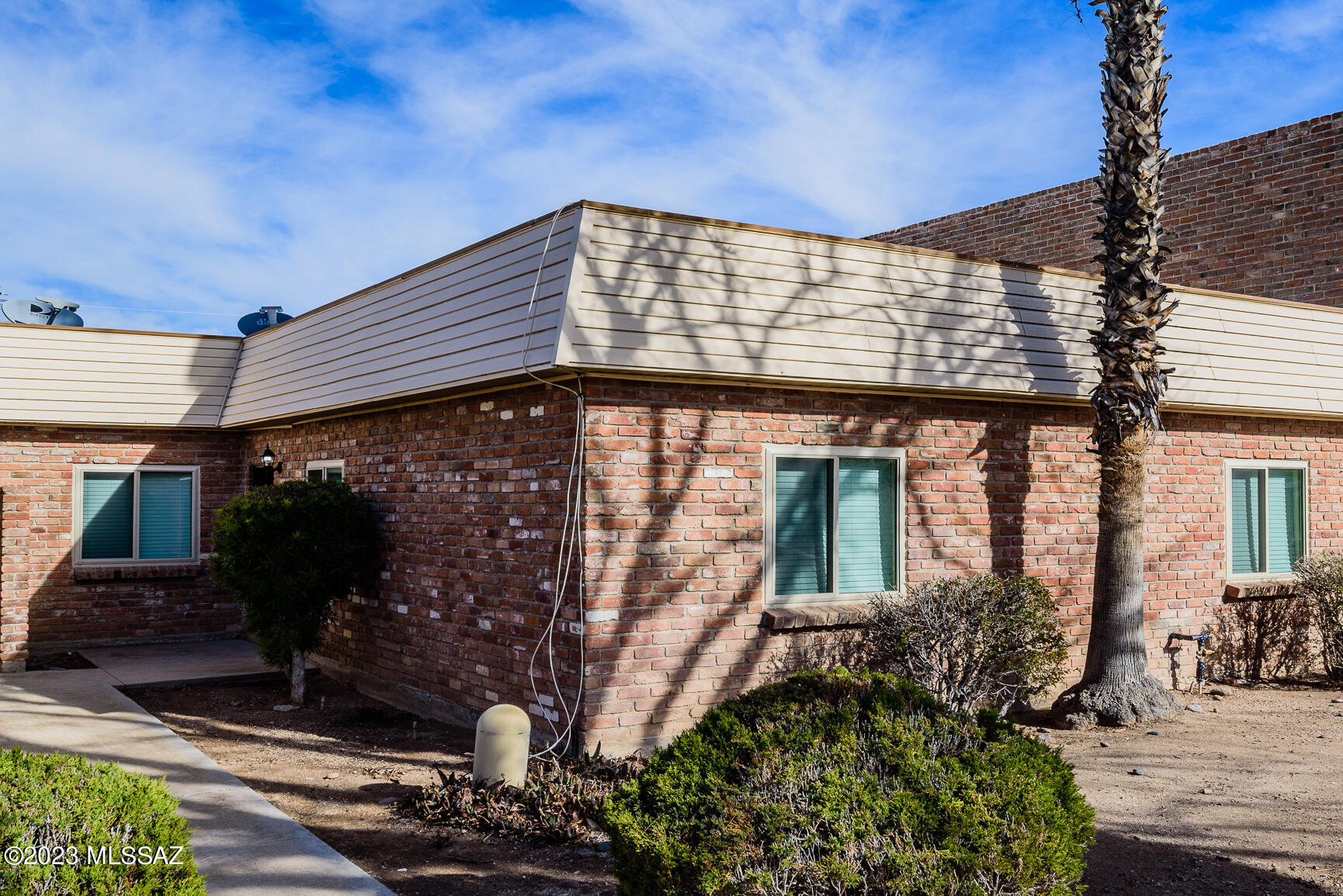 WOW! Completely remodeled 3 bedroom/2 bathroom Townhome in East Tucson. This rare gem offers a modern vintage vibe with a unique floorplan. Kitchen sits between the cozy tiled sitting room and the TV room - perfect for entertaining. Kitchen boasts new cabinets, granite counters, all new stainless appliances, pull out shelving and breakfast bar. Grande Primary suite with remodeled Primary bath. Freshly painted, new flooring throughout, neutral palette. Courtyard patio with sunshade and brick pavers. New water heater, fixtures, lighting and the list goes on. Water, sewer and trash included with the rent. Call Daniel to schedule a viewing 520-777-6507 ext. 2. Background check for anyone over 18 - $50 app fee. Sorry this home is not pet friendly.