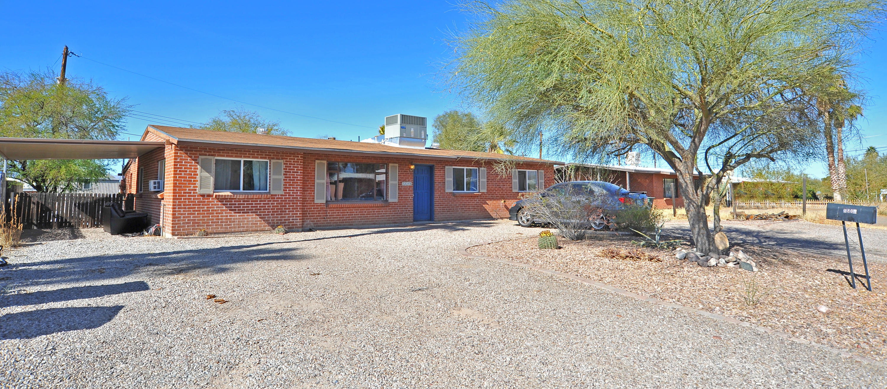 Range priced. Seller will accept or counter offers between $204,000-$214,000. Ideally located Central Tucson home just 1.5 miles from U of A and 1 block from Mountain Ave bike trail and CatTran route. Large classic red brick home w/hard-to-find 5 bedrooms/3 bathrooms. Two living areas including front living rm off kitchen and another living area with fireplace that has multiple uses such as game rm, office, family rm.  Split floor plan. Two bedrooms feature updated en-suite baths. New high-quality American Standard 5-ton combined unit installed in '15 for approx 11K! DP windows. Good size enclosed backyard w/storage shed. 1 car port & plenty of on & off street non-permit parking. R2 lot & no HOA. Close to Salpointe High School. Great rental or make it your own! Do not disturb occupants.