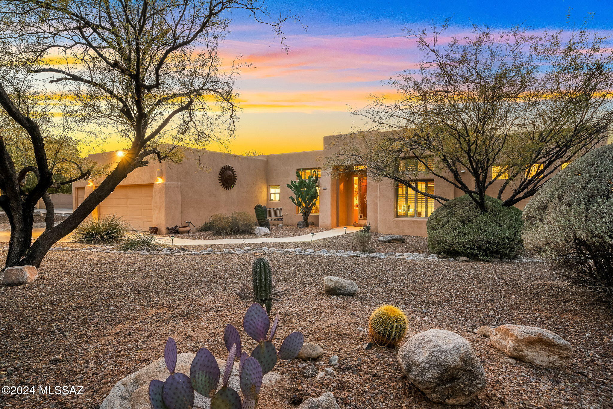 Seller will entertain offers between $850,000 and $870,000. Nestled in the Bear Canyon area of Tucson, this stunning semi-custom-built home offers a perfect blend of modern comfort & Southwest charm. Situated on a .8 acre lot, adjacent to undeveloped land, this property provides ample space, privacy & breathtaking views of the Catalina Mountains. This home boasts 4 bedrooms & 3 baths, with an open-concept floor plan that maximizes natural light & provides a seamless flow between indoor & outdoor living spaces. The floor plan has a formal living room/den & dining room, along with a spacious great room that seamlessly connects the kitchen & family room. The expansive backyard is a true retreat, featuring a heated pool, covered patios & spectacular sunset & mountain VIEWS! Owned solar! electric bills low! Call for your private showing! Make this HOME yours today!