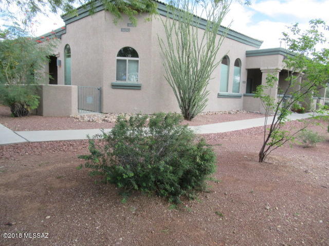 Located near Tucson Mtn Park, you will really enjoy living in this attractive, move-in ready, 2-bed, 2 ba townhome that offers you both comfort, convenience and affordability. Amenities include vaulted ceilings, ceramic tile flooring, fresh paint throughout, new bedroom carpet, great room floor plan, spacious kitchen with lots of cabinets & breakfast bar, 2 covered patios, community pool and spa, PLUS it comes with all appliances including washer/dryer. This home offers you the wonderful opportunity to live next to Tucson Mtn Park & it is a short drive to shopping, the Interstate, and major employment centers.