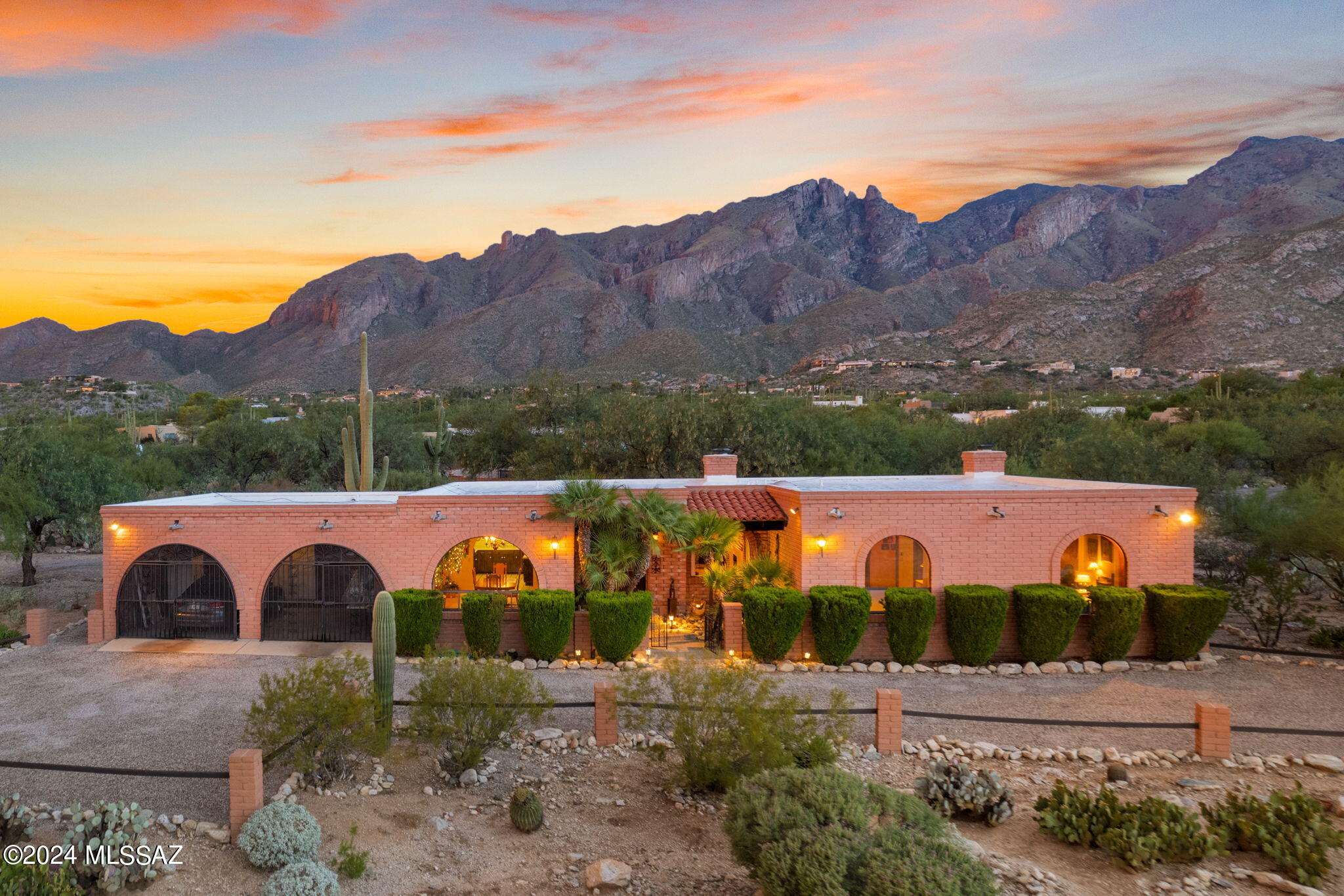 Stunning Mountain & City Views are just the cherry on top in this spectacular Foothills beauty! This classic adobe brick 3bed/2bath home offers spacious living areas with large windows that flood the space with natural light & showcase the surrounding beauty. Outdoors you can enjoy the sparkling pool while taking in the world-renowned Tucson sunsets. The Great Room has a cozy beehive fireplace & is the perfect spot to gaze out into the picturesque views of the backyard. Or head over into the formal dining area to truly enjoy the magnificence of the Catalina Mountains right outside your window. Each bedroom has plenty of space to unwind, large closets & ceiling fans. Both bathrooms have double vanities & upgraded showers & tons of natural lighting. This is the one you've been looking for!