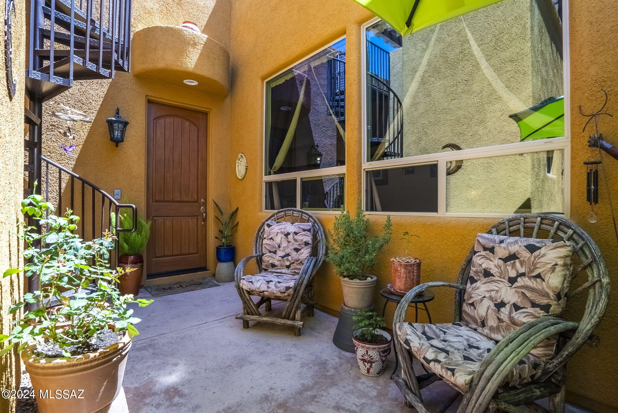 Two bedroom townhome in the Embarcadero! Experience the luxury fabulous resort-style amenities in this open-concept townhome located in the Tubac Barrio across the carport for easy access to your home. Gorgeous multi-level outdoor space includes a covered sky deck featuring, an ideal spot for al fresco entertaining with views of the Tumacacori and Santa Rita Mountains. Lovely kitchen features custom cabinetry, granite countertops, and stainless steel appliances. Owner's retreat includes spa-like en suite bath and walk-in closet. Some furnishings convey with the sale of the home. Embarcadero amenities include pool, spa, fitness studio and walking trail connecting directly to the Historic De Anza Trail with the Village of Tubac to the north and Tumacacori Mission to the south.