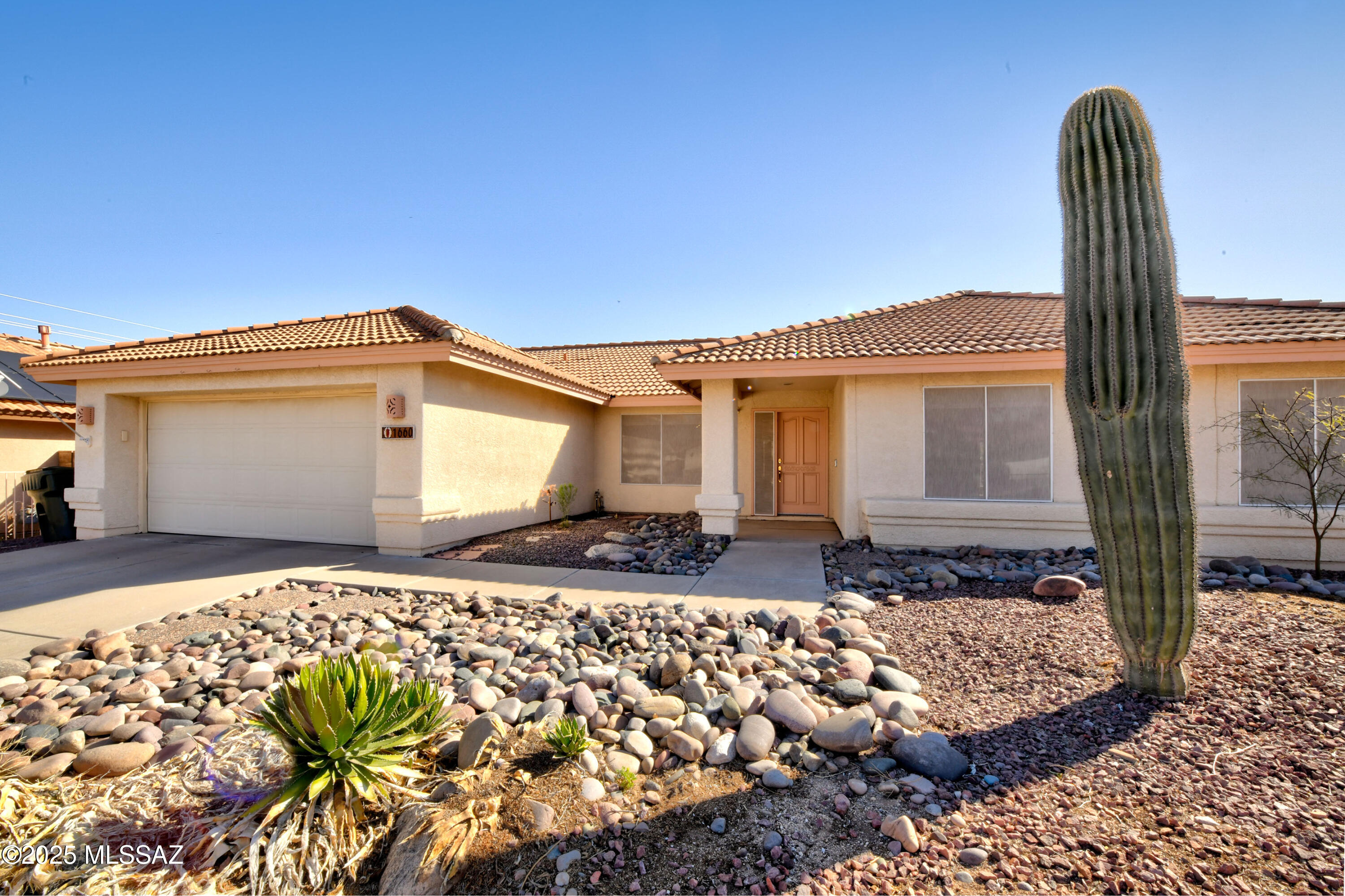 This welcoming single-family home offers mountain views and a large backyard with a refreshing pool and covered patio, a great place to relax or entertain. Inside, high vaulted ceilings create an open feel in the spacious living and dining areas. The kitchen features a gas range, plenty of cabinets, ample counter space and opens to the breakfast nook and family room, a great space for casual gatherings. The large primary suite includes dual vanities, a walk-in shower, and a generous walk-in closet. Two additional bedrooms share a guest bath with a tub/shower combo, and there's also a convenient powder room. A fully fenced front yard including a private gate and the two-car garage provides extra storage. Great northeast location close to shopping, dining, parks and hiking.