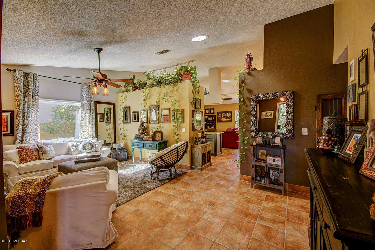 Seller will except or counter offers between $230,000-$245,000. Beautiful and fully upgraded.  Open floor plan, front living room with bright open space,  Huge picture windows that look out into your private back yard oasis with pool and ample storage areas, Cathedral ceilings add to the open spaces in every room. Over sized Master bedroom with one of a kind closet doors and features every direction you look. Built in stunning pocket desk in first bedroom. New AC. New and upgraded double pane windows. New AC unit.  New Hot water heater and gas range Large pantry and laundry room. Back yard has a firepit, pool and privacy with lush oasis plants. Garage has shelving and great amounts of storage. All this and NO HOA. Come soon to see this beautiful home with sellers pride in abundance
