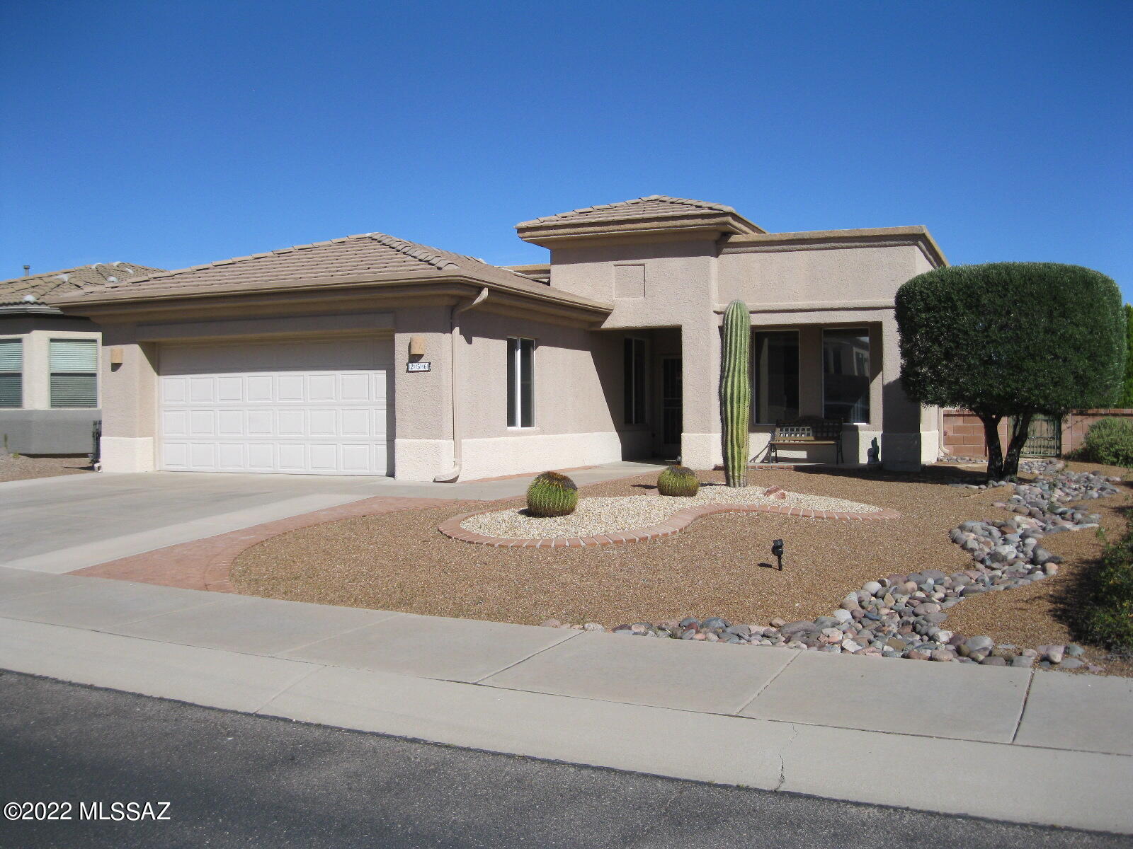 Lovely Las Campanas home centrally located in the heart of Green Valley near I-19, many shops, restaurants, farmers market  & golf courses.  Open floor plan with great room, 2 bedrooms and a den/office. All new carpet in great room, den and both bedrooms. Lots of storage in kitchen and laundry room. Covered patio and extended Pergola offers great entertainment space. New irrigation system installed in backyard January 2021. Beautiful flowering shrubs and partial mountain view.  Home is part of Green Valley Recreation (GVR) which has 13 centers with pools, spas, exercise rooms, pickle ball, tennis, etc. and offers classes in music, art, dance, games, photography, trips & more.  Home is close to one of GVRs newest recreation centers, with amenities that include pool with a chair lift, spa, fitness center, meeting rooms, kitchen for catering events, tennis courts, racquetball courts, Bocce court and an outdoor ramada.
