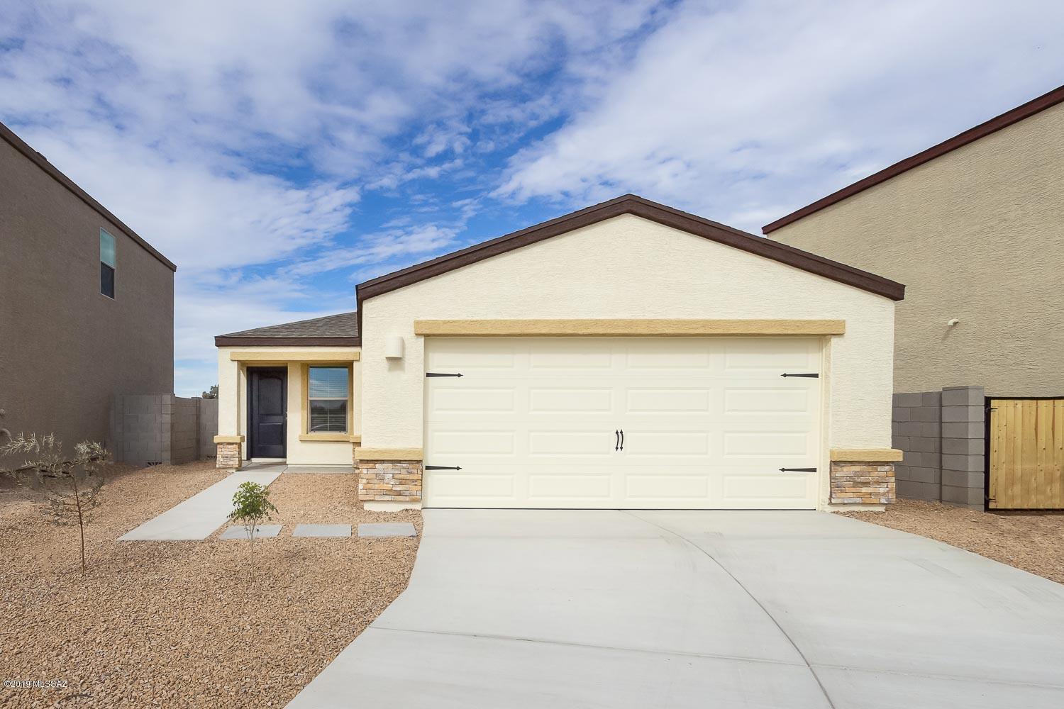 The beautiful Ironwood plan is located within the picturesque community of Cantera. This new one-story home features an open floor plan, 3 bedrooms and 2 full baths, complete with thousands of dollars in upgrades. Upgraded features include energy-efficient kitchen appliances, granite countertops, designer wood cabinets, brushed nickel hardware and an attached two-car garage. The Ironwood showcases a luxurious master suite complete with a walk-in closet, as well as a fully fenced backyard, and front yard landscaping. In addition, Cantera provides residents with easy access to the best of Tucson. To schedule a tour of this home, please call 520-849-6120 ext 19.