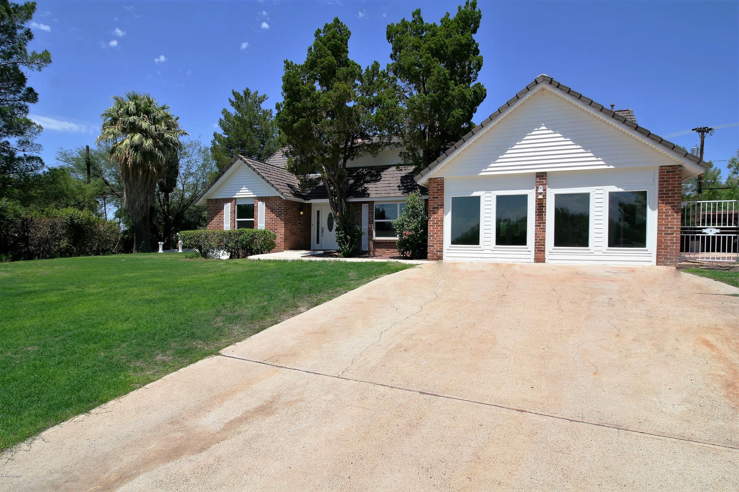 With its storybook details (think Hansel and Gretel) and countryside charm (even in the heart of this city), there's no more romantic style than in this tastefully decorated remodel (the pictures tell the story!). This fabulous home features large bedrooms (four), Three full baths, a huge recreation room, a tastefully coordinated all new kitchen with a pantry, closets, cabinets, and storage galore. As you would expect the paint is done but so are all of the windows, carpet, doors, and bathrooms! There is so much to see that it would take a small pamphlet to list all the goodies. A must see that is close to a 170 acre park(Udall) as well as all of the other businesses that make life easier but still off of the beaten path. Hurry, you are going to love this home!