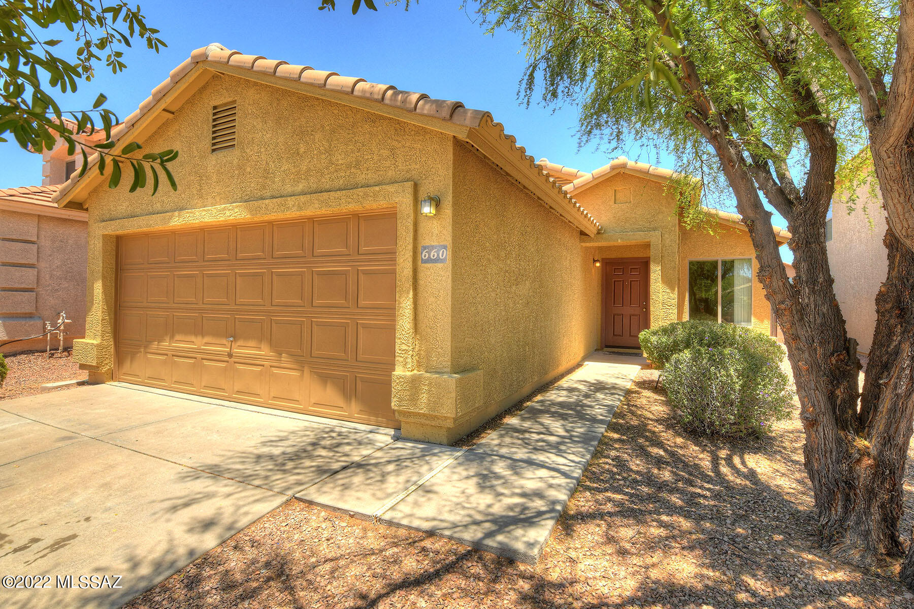 The PERFECT starter home for a new family or young professional.  Situated on a large lot with a spacious yard, this home offers unlimited potential for play sets, pets, gardens, or even the swimming pool you have been dreaming of!  Enter into the living area where friends and family will gather for holidays and special occasions.  A bright and pretty kitchen has a family room adjacent, perfect for a TV room, play room, study hall, or simply watching the kids while you cook.  Sliders lead out to the back yard, so you can even see the kids while they are outside.  A large island in the kitchen is a prep area or breakfast bar.  Three bedrooms accommodate a growing family, guests, or use one as your ''work from home'' office.  
The roomy master has two closet spaces, (his and hers?), and is tucked away at the end of the hallway for privacy.  All of this ensconced in a centrally located neighborhood with its own parks, and close to schools and shopping!  You have found your new home!