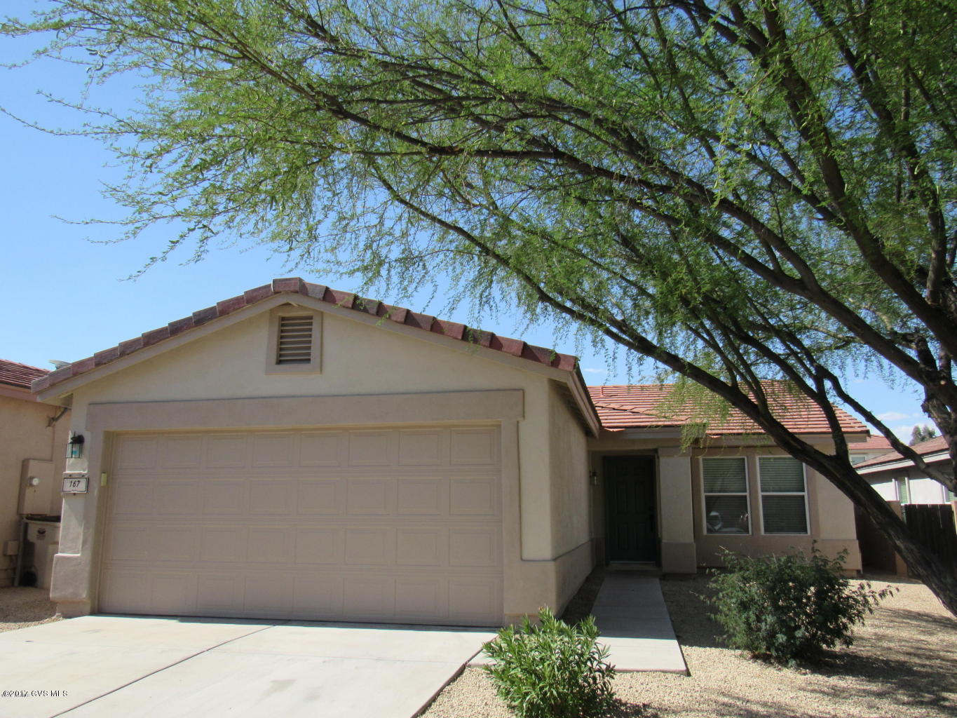 Check out this deal! 3, 2, 2, with new paint inside and out, upgraded tile flooring throughout, with no carpet. The kitchen boasts Corian countertops, maple cabinets with a cherry finish and black appliances. Refrigerator, washer, and dryer included. All rooms have window treatments and ceiling fans. Backyard has a rear covered patio, with extended paved concrete and grass. Super clean and move in ready! Award winning Anza Trail and Walden Grove school district.