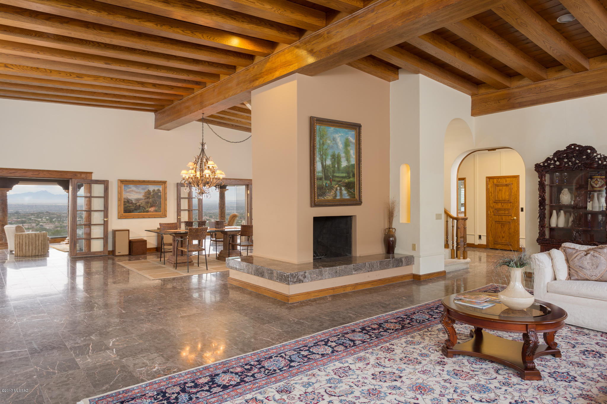 SPECTACULAR GEM IN PRESTIGIOUS GATED SKYLINE COUNTRY CLUB ESTATES WITH JAW-DROPPING MOUNTAIN AND CITY VIEWS. VIEWS LIKE NO OTHER, UNRIVALED PRICE & ALL FURNITURE GOES WITH THE PROPERTY! RUMORED TO ONCE BE OWNED BY CLASSIC ICON, ALICE COOPER. ENTERTAIN IN THE GRAND ROOM OVER-LOOKING THE ENTIRE CITY W/ UNREAL SWEEPING VIEWS OF THE WHOLE CITY. EXQUISITE FINISHES INCLUDE MARBLE FLOORING, CHEF'S KITCHEN FEATURING GRANITE COUNTER TOPS, 2 SUB-ZERO REFRIGERATORS AND COUNTER TOP SPACE GALORE. ELEVATOR FOR YOUR CONVENIENCE. THE FLOORPLAN CREATES THE FEEL OF WARMTH AND INTIMACY WITH SWEEPING VIEWS FROM JUST ABOUT EVERY CORNER OF THE HOME. WOULD MAKE FOR A FANTASTIC HOME OR POTENTIAL LUXURY ASSISTED-LIVING HOME.