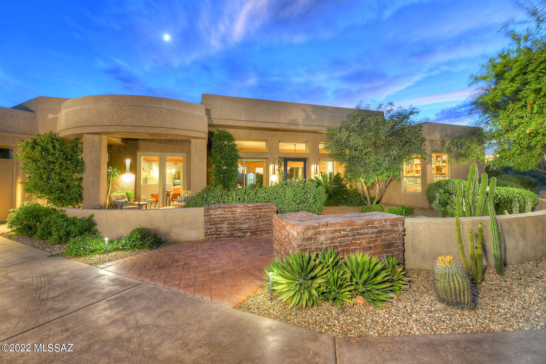 STUNNING SOFT CONTEMPORARY IN PRESTIGIOUS PIMA CANYON. THE 3358 SQ.FT. 3BR/3BA HOUSE FEATURES A GREAT ROOM & DR, OFFICE, FAMILY ROOM, COZY BREAKFAST RM & SPLIT BR PLAN.    LUSHLY LANDSCAPED YARD W/75' LAP POOL, BUILT-IN BBQ & LARGE COVERED PATIO IS PERFECT FOR ENTERTAINING.  THE DRAMATIC GLASS PIVOT DOOR OPENS TO THE GREAT ROOM W/CUSTOM STONE FP, EXQUISITE ITALIAN LIGHT FIXTURE & CONTEMPORARY BUILT-IN BUFFET THROUGH   THE FAMILY ROOM W/COZY KIVA FB AND CHARMING BREAKFAST ROOM OPEN TO THE CHEF'S KITCHEN W/LARGE ISLAND, VIKING RANGE, SUB-ZERO REFRIGERATOR, WINE REFRIGERATOR, ELEGANT BACKSPLASH & GRANITE COUNTERS.  THE PRIMARY SUITE W/ SPA-LIKE BATH, SOAKING TUB, SHOWER AND DOUBLE VANITIES, DOUBLE CLOSETS IS SPACIOUS AND BRIGHT.  NEARBY IS AN OFFICE W/ BUILT-IN BOOK CASES & CABINETS.  (CON'T) TWO GUEST SUITES OFFER PRIVACY & FEATURE 2 FULL BATHS AND A LOVELY PATIO.   PERFECT MELDING OF ELEGANCE AND CASUAL TUCSON LIFE STYLE THAT DISCERNING BUYERS SEEK.