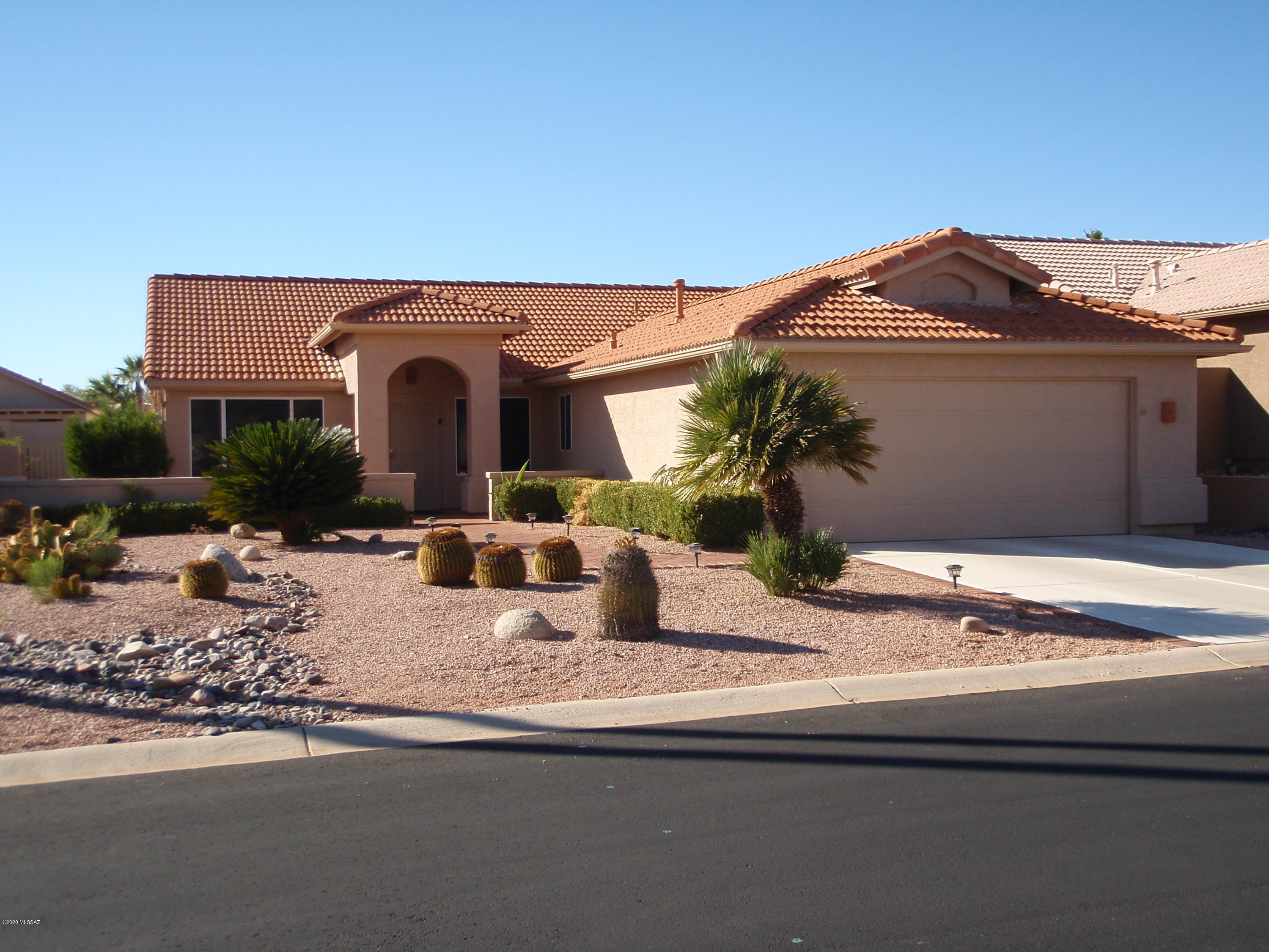 Beautiful Diego model located in Saddlebrooke has Catalina Mountain Views from front courtyard. 2 bedrooms 2 bath, formal living room family room open to the kitchen and 2 dens/office. One den is off the master bedroom so is great for a sitting room with access to the backyard. Backyard has a putting green.