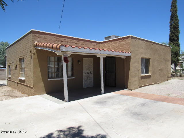 VALUE AND MORE VALUE. Great opportunity to own a your own home at a value price. Spacious living, open floor plan. Solid masonry block construction. Large R-3 lot, big storage or workshop off carport.  Great value at a modest price. Affordable living for the budget minded. Investors are welcome. Located near Ajo and 6th Ave. Value priced for minor repairs. Must see. Back on market.  Call for your private viewing. Price reduced.
