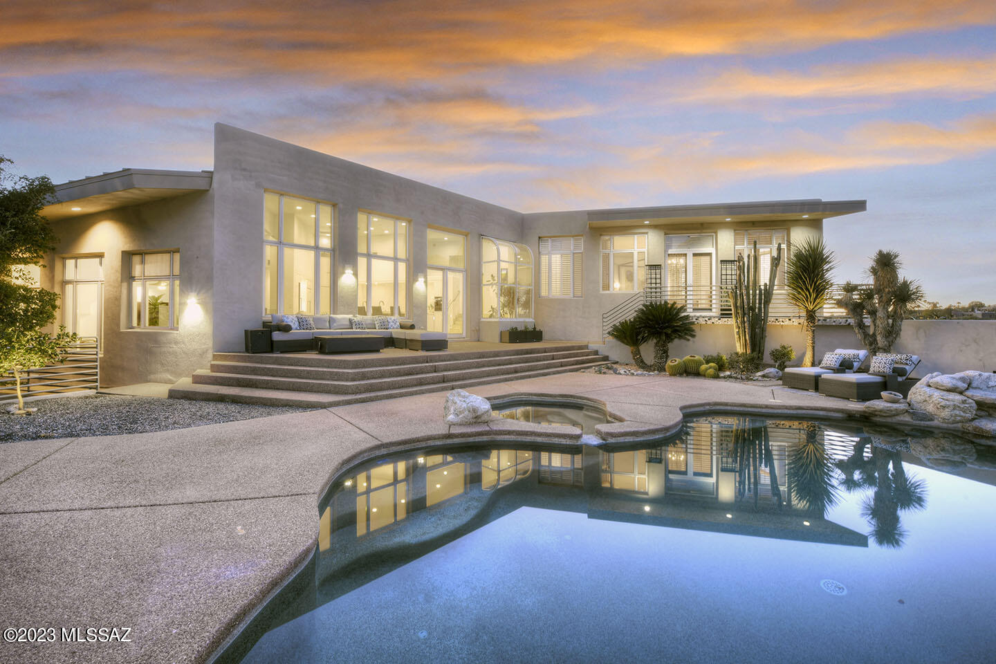 Modern Masterpiece perched on a hilltop with phenomenal Mountain & City Views from two large patios, deck & balcony (all w/amazing views) in Gated Foothills II.  Recently completed approx $250,000 kitchen & Baths renovation. Showcasing an ultra modern white kitchen featuring Nickels Custom Frameless Cabinetry in Alpine White Gloss w/ all drawers & pull-outs,  huge Waterfall Island, Quartz counters, Subzero, Wolf & Miele Appliances (see Documents) . Ideal floorplan works for families or winter residents, with 4 BR, Sep. Office w/on suite bath, 3 other full Baths, & 3 car Gar.  New Primary Bath w/white gloss cabts, Quartz, freestanding tub, massive shower, Toto Bidet toilet, & backlit mirrors.  Back patio w/Mtn views beyond compare, pool, spa, waterfall & fireplace. Premier neighborhood!