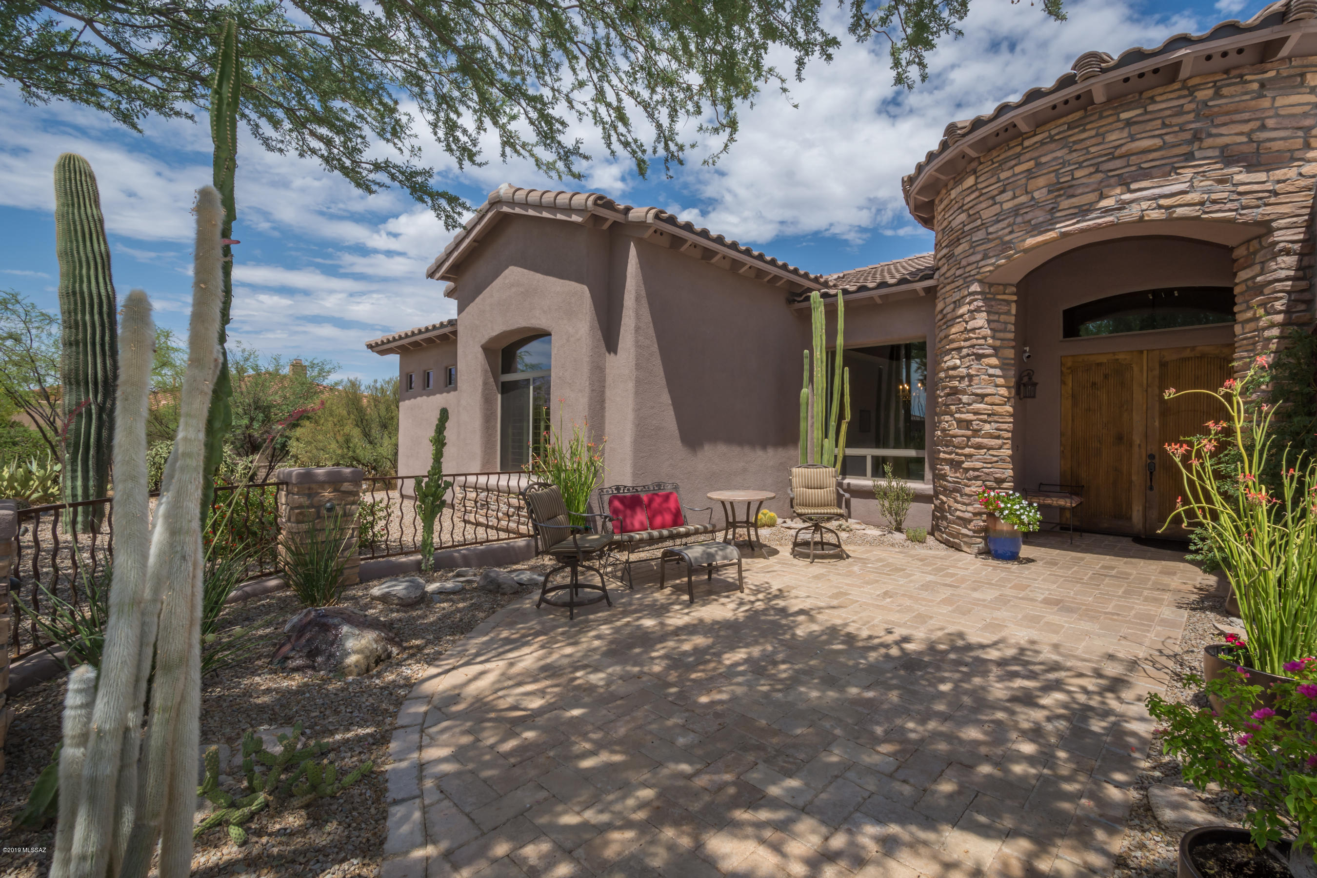 Gated semi-custom Dos Lagos. on over 1/2 Ac. on Gallery South Course, 15th fairway!  Catalina views from front pavered CTYD. Roomy foyer opens to large open LR w/ wall of windows & stacked stone FRPL. Travertine thru out home. Formal dining w/ crystal chandelier.  Greatroom kitchen opens to family & living room & has SS appliances,, 5 burner gas cooktop, oven & micro, trash compactor, granite.  opens to FR. Secluded/Split Mstr has double door entry, sitting area,, 2 closets, jetted tub, dual shower heads. BR 2 w en suite bath. BR 3 has access to hall bath. Laundry w/ cabs & sink. Den w/Murphy bed w/ barn doors. LRG covered & uncovered patio areas, fire pit, blt in BBQ, putting green, pool w/waterfall overlooking the golf course, MTNs & stunning sunsets. 3 car gar. Call for private showing