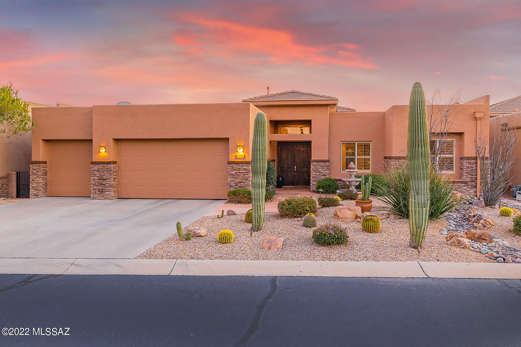 One of Oro Valley's finest gated communities, Fairfield in Rancho Vistoso! This Luxury resort style masonry home is located on the premium lot backing up to open space, offering sunrise, sunset and  Catalina Mountain Views! Extremely functional floor plan, 2 bedrooms and 3 baths plus den. Expansive granite island Kitchen with newer stainless steel appliances, new granite countertops. and breakfast bar. Great Room with high ceilings and windows that frame the desert and mountain views. Spacious owner's suite with remodeled bath with walk-in shower, dual sinks and soaking tub. Covered back patio with built in BBQ, fireplace, pool and charming garden area. THREE car garage with epoxy flooring and storage cabinets. Just steps away from the community pool. Closely located to  Stone Canyon Club.
