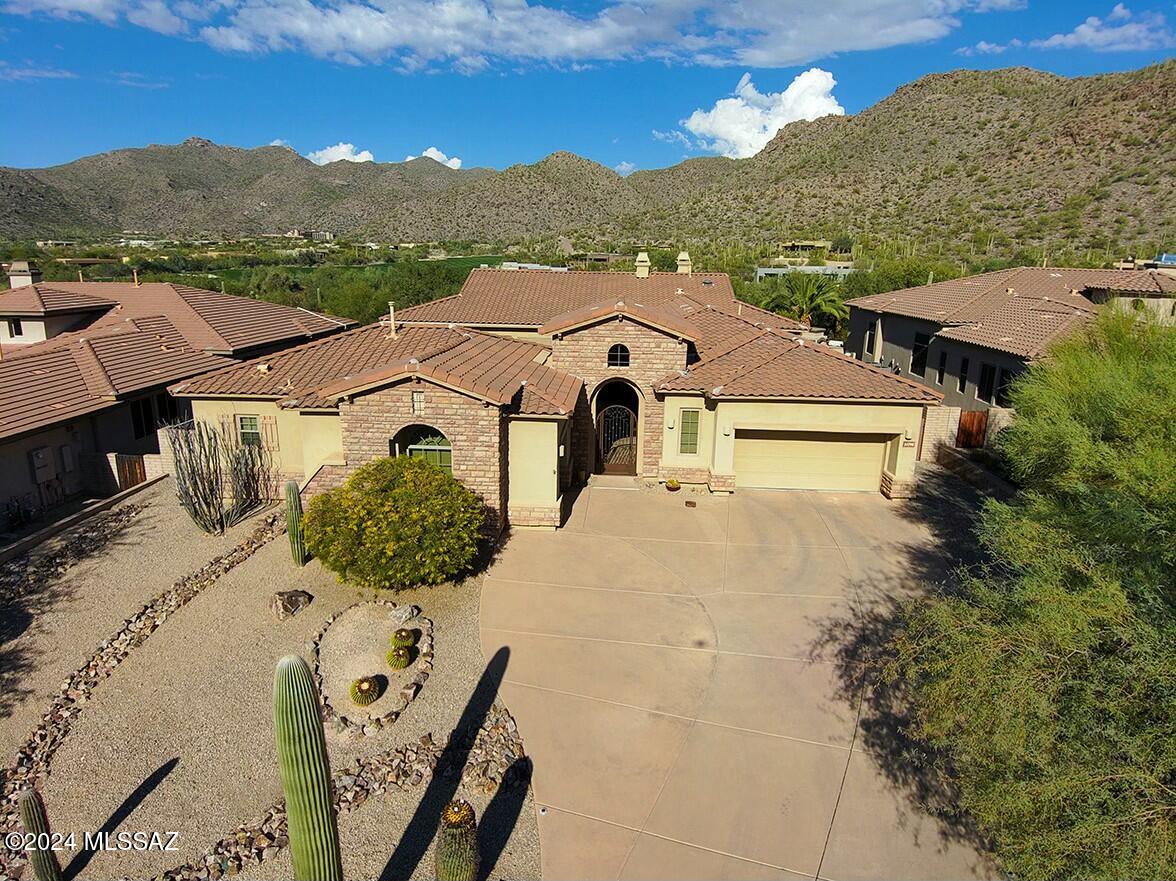 Toll Brothers at Solana! Situated on the 17th fairway of the Gallery North course w/ stunning Tortolita views. This 3498 Sq. Ft home plus 669 sq. Ft. Casita sits on almost a half acre. Expansive kitchen overlooking paved private courtyard w/ covered pergula, & BBQ. The gourmet kitchen offers  Dacor cooktop, double ovens, large walk-in pantry and breakfast area. Open plan w/ dining & greatroom  w/ frpl taking in the views. Spacious updated primary BR w/ sitting room retreat & fireplace. Remodeled primary BA offers double sinks, make up area, soaking tub, walk in shower & spacious walk in closet. The secondary BDRMS share updated jack & jill BA. What could be a 4th BDRM is a den/office w/ golf course views. The casita entails living space w/ BD & BA. Enjoy golf views from  Bacciball  court!