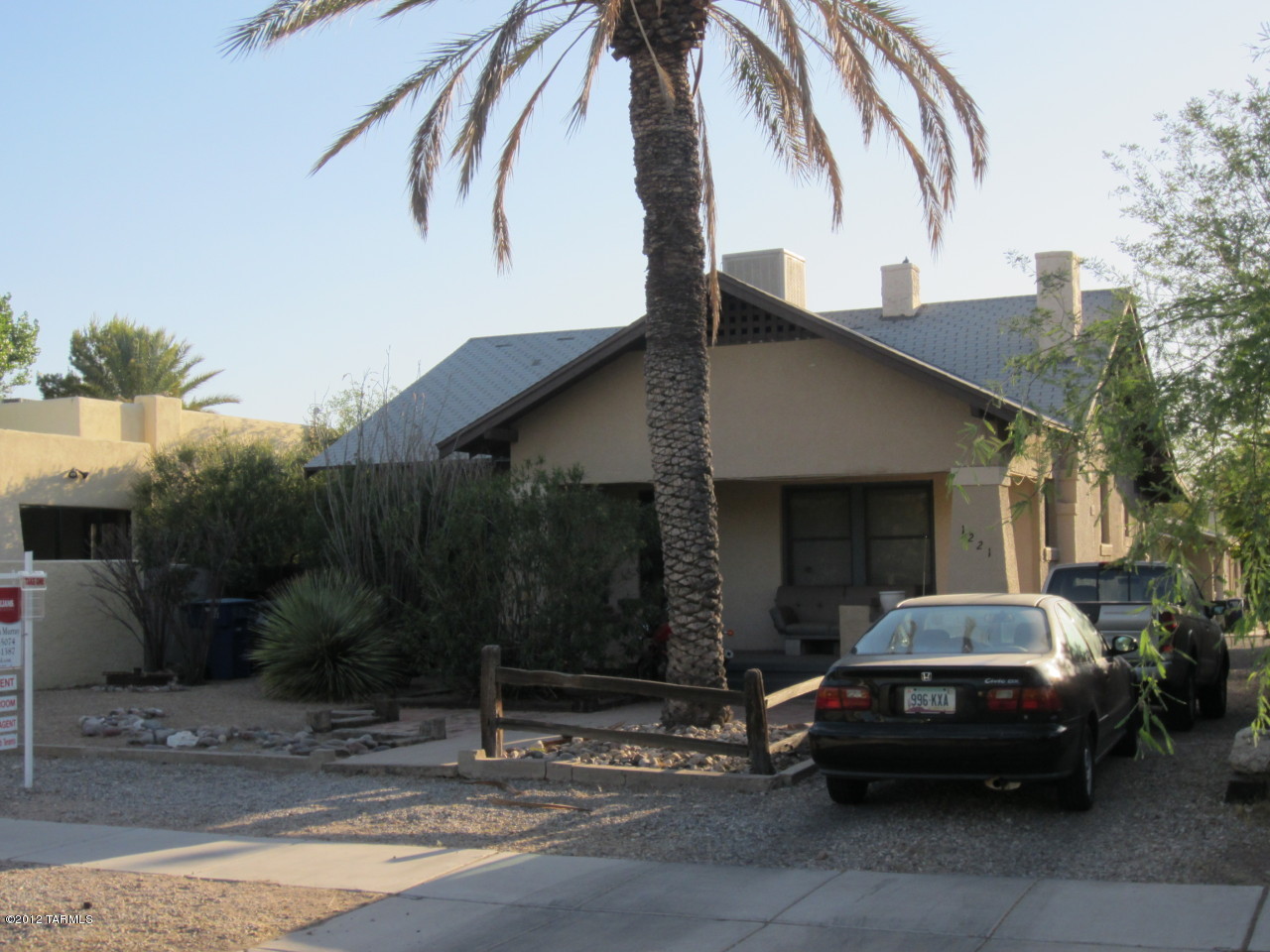 AVAILABLE AROUND AUGUST 1ST. This charming & affordable 1924 California Bungalow is located in a quite historic neighborhood that is just a few blocks from the U of A, downton, & the 4th Ae. Business District. Some of this features of this 3 bedroom home (2 bed. with den) include oak floors, fireplace, alarge front porch, fenced yard, washer & dryer, & storage shed. Please contact the listing agent or your own agent to schedule a showing & learn of the best viewing days & times for vacating tenants. Let us know if you have any questions regarding this property, our standard lease terms, our rental application requirements, and/or the pet policies.  One owner is a licensed to sell real estate in the State of Arizona.
