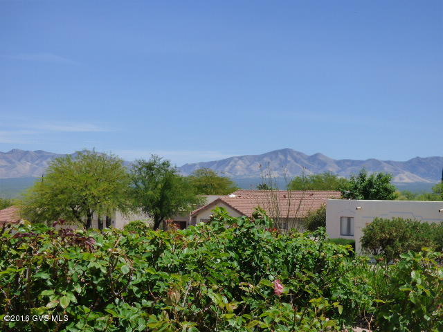 Charming Portillo Place Home, Great Views, 2 Bedrooms, Den, Dining Area, Kitchen Nook and a Two Car Garage. Open Floor Plan, Davis Kitchen Cabinets, Ceiling Fans, Walk-In Shower. Low Care Front and Rear Yards, Huge Screen-In Patio that has wonderful Views of the Santa Rita Mountains.