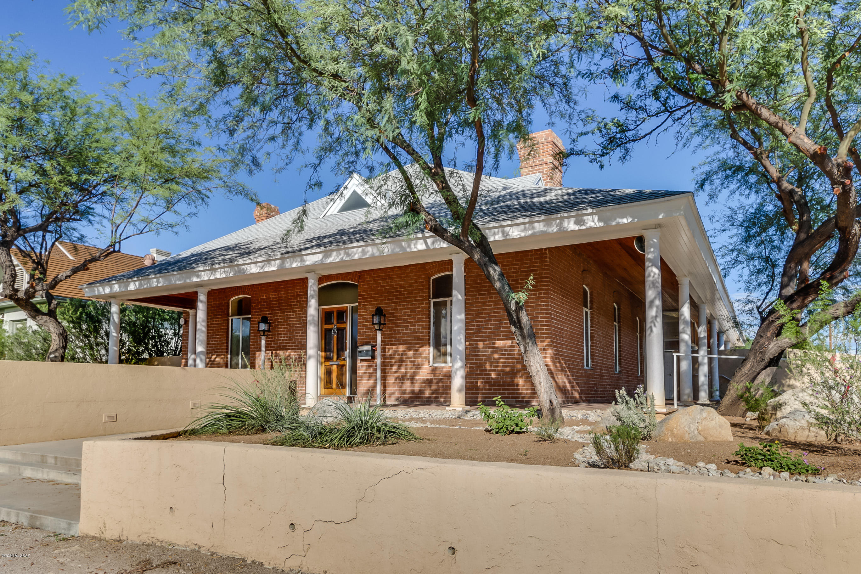Endless possibilities & Recently Updated! 9BD/6BA Private Double Brick Corner Lot Compound located in the heart of Tucson Zoned HC-1, which allows for several uses. Main House is 6BD/3.5BA plus an expansive loft, 3 Studios w/private entrances and 1 Office towards the rear of the property w/back alley access. Located right off of the 4th Ave Retail District and walking distance to the Univeristy of Arizona and Downtown Tucson, there is no better location. This property has unlimited potential as a private residence, care home, multi-use income property, office and so much more. Landscaped backyard, covered patio, bocce ball court, individually metered for electricity and all set for specialized housing or other uses. Dream big!