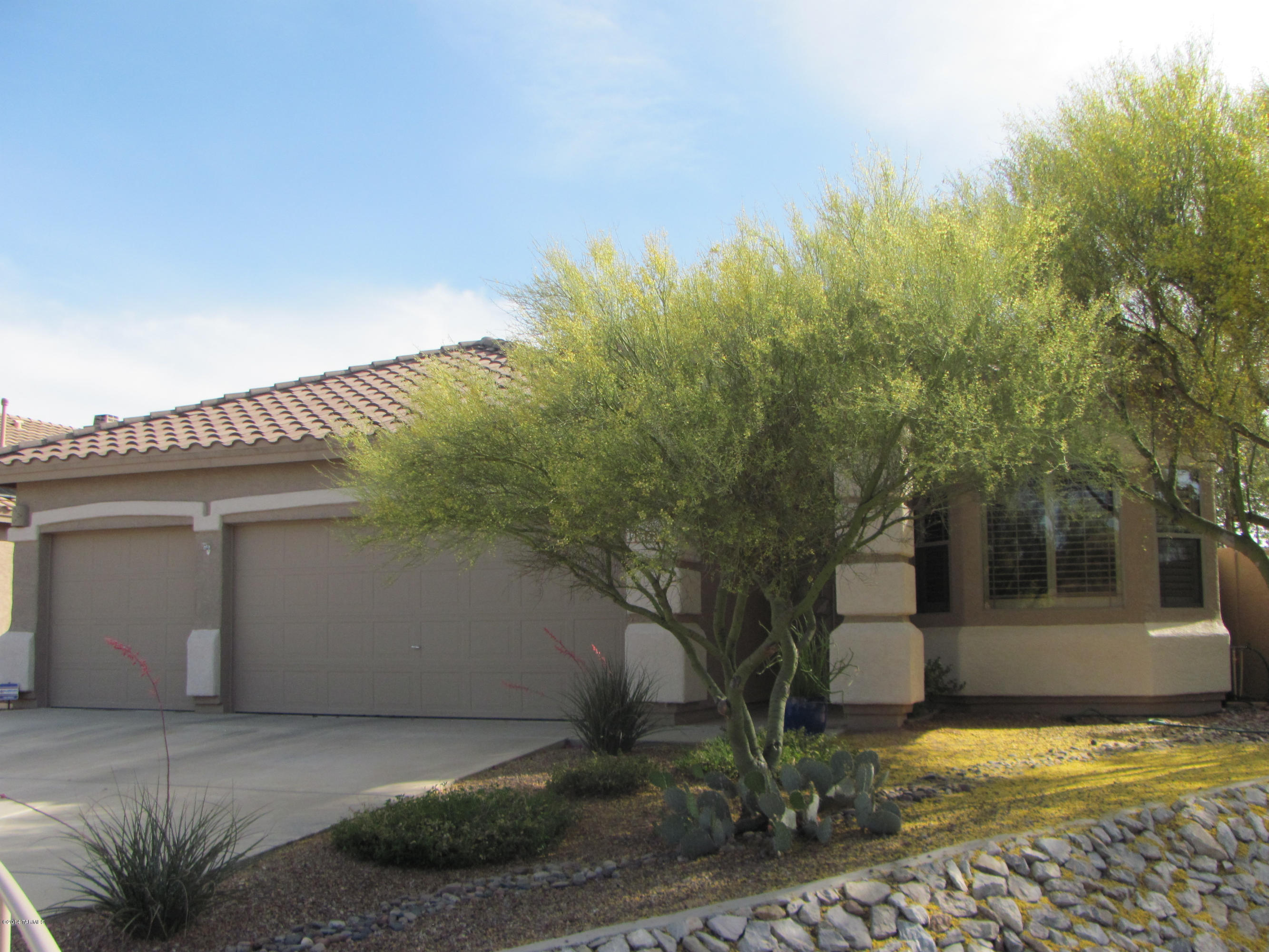 Built 1999. Spacious Rancho Vistoso home with fantastic views!  Fully equipped gourmet kitchen, upgraded ceramic tile & wood flooring, carpeted bedrooms, formal living room, family room, gorgeous master suite, three car garage. Beautifully landscaped backyard is perfect for entertaining or relaxing. Covered patio with rolling shades, build in BBQ, pool & spa (service included), lots of privacy, close to Big View Park. Pets are subject to approval. Furnishings in photos do not convey. **RENTAL RATES REFLECT A $65 CONCESSION FOR TENANTS AGREEMENT TO CHANGE HVAC FILTERS MONTHLY.  RENTAL RATES ARE $65/MO HIGHER THAN STATED W/O CONCESSION.**