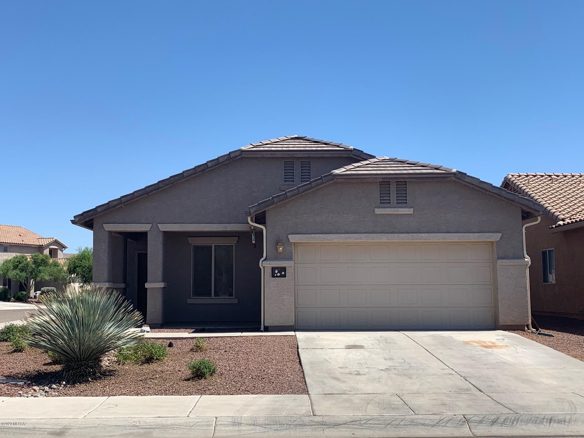This home is on a corner lot, has a large back yard, updated flooring, and an open floor plan. The Village of Red Rock has many amenities to enjoy such as pools, walking paths, volley ball courts, basketball, and baseball. Come for a look, it will truly capture your heart.